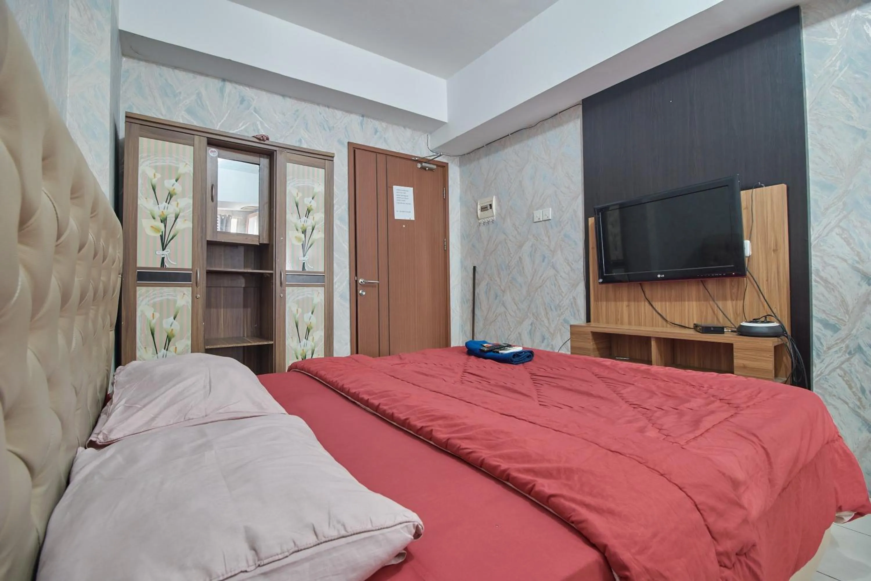 Bed in Apartment Green Lake View Ciputat by Celebrity Room