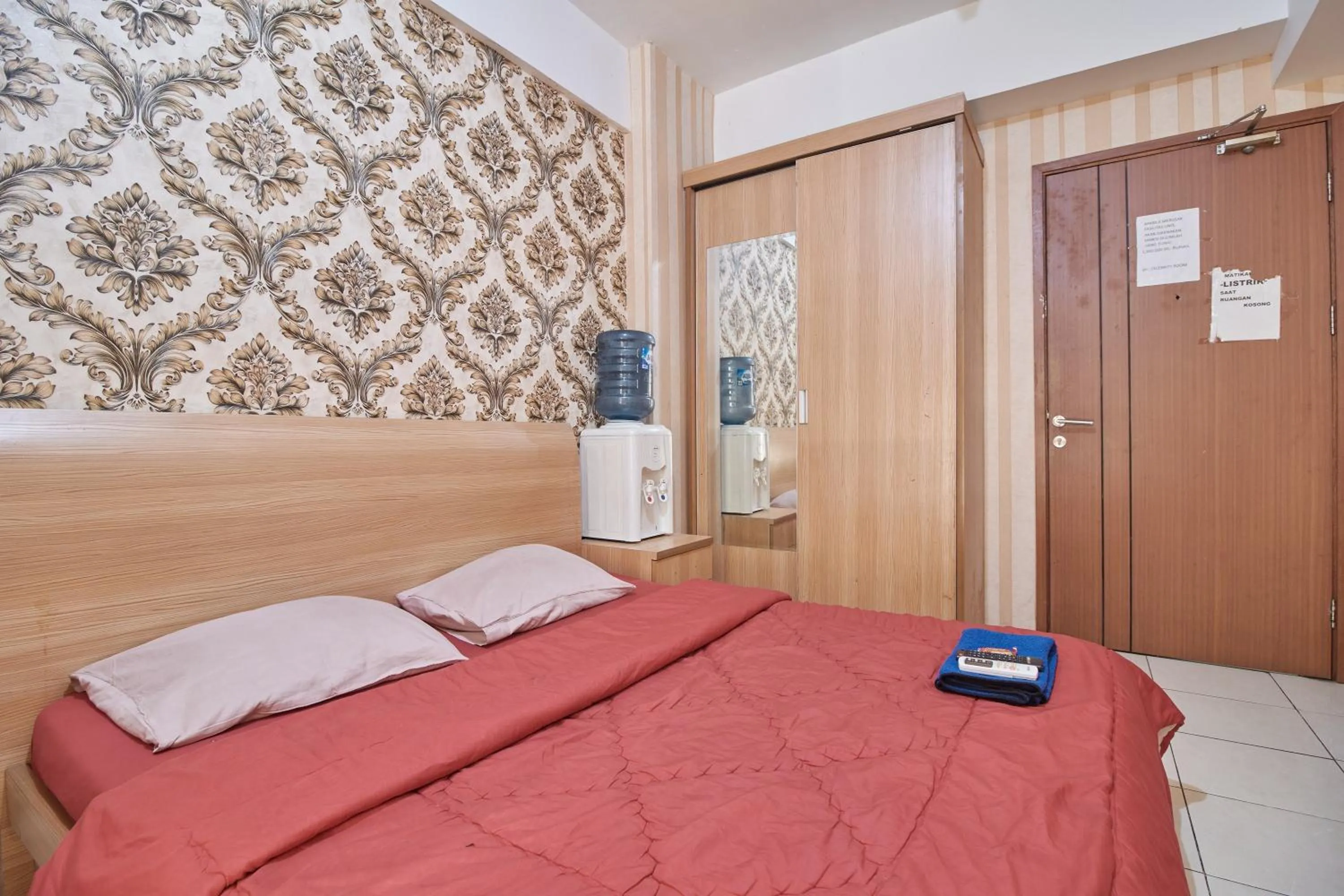 Bed in Apartment Green Lake View Ciputat by Celebrity Room