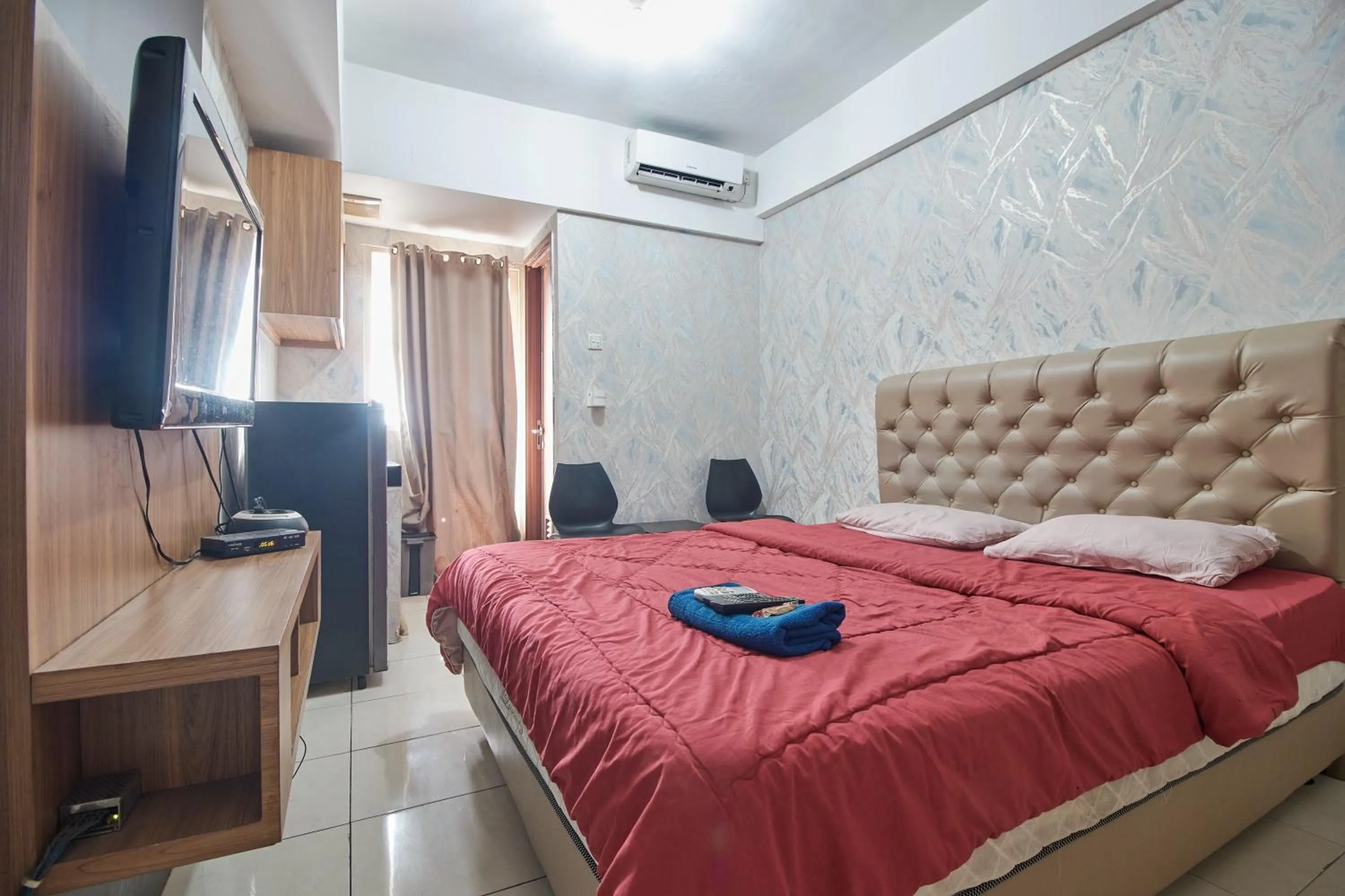 Bed in Apartment Green Lake View Ciputat by Celebrity Room