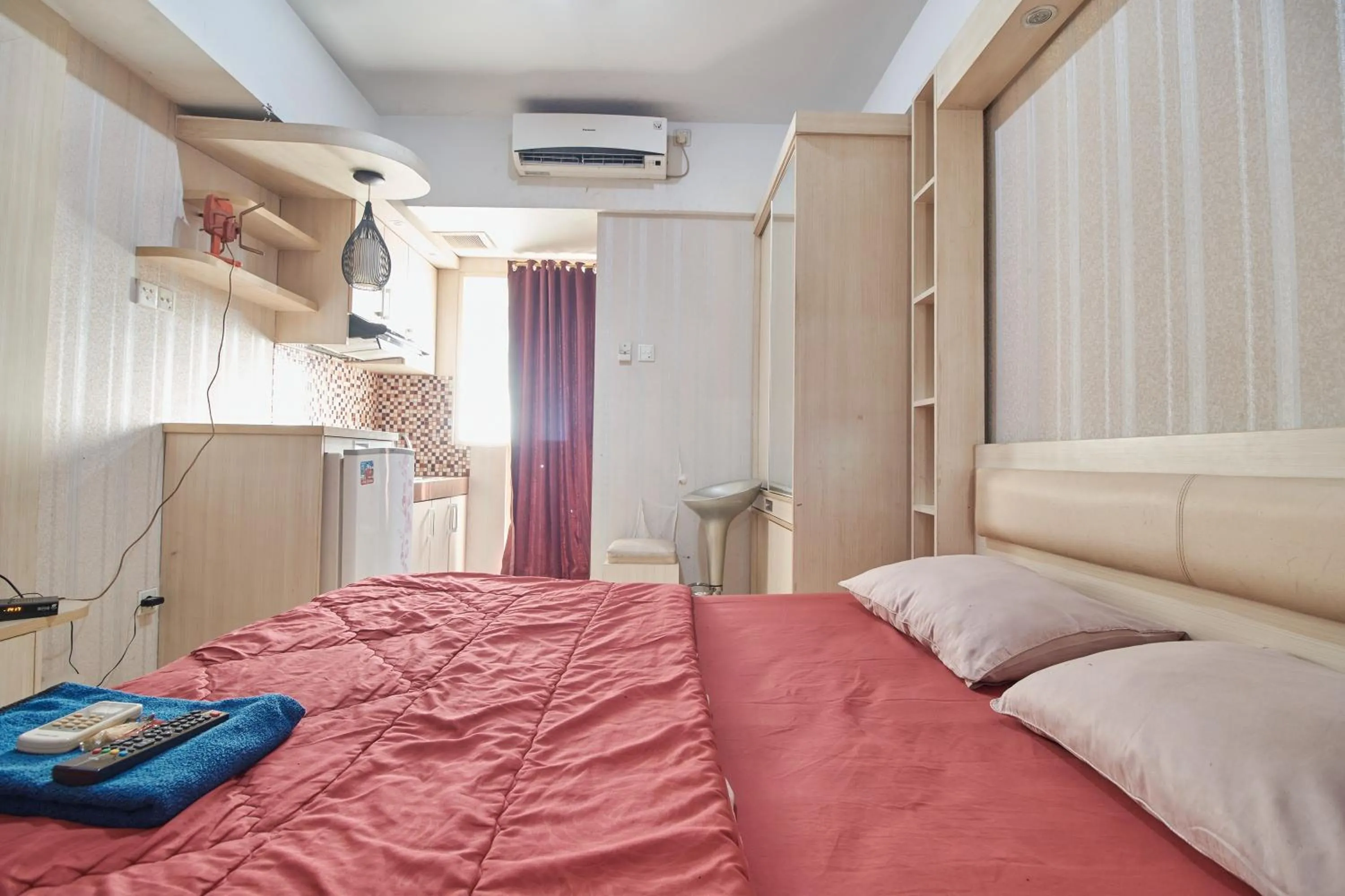 Bed in Apartment Green Lake View Ciputat by Celebrity Room