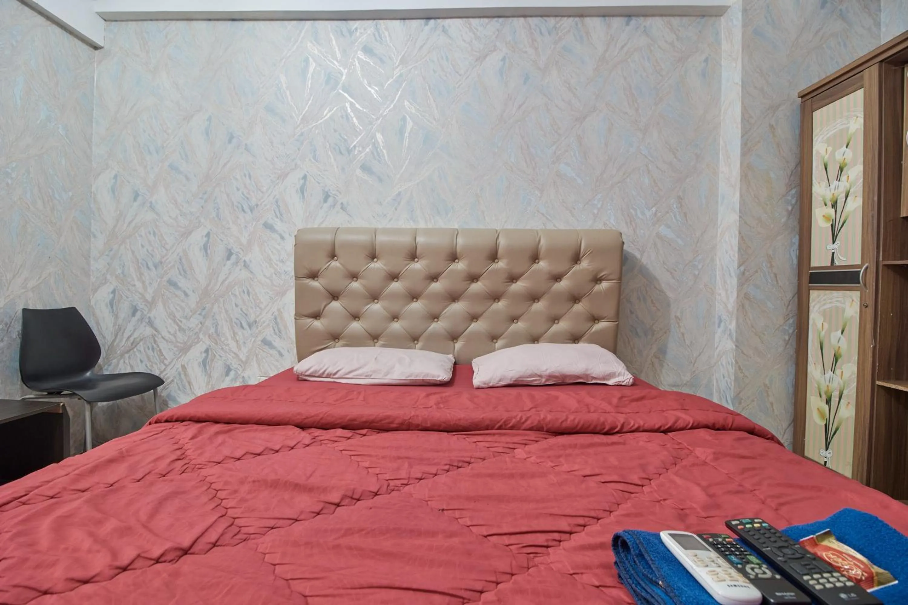 Bed in Apartment Green Lake View Ciputat by Celebrity Room