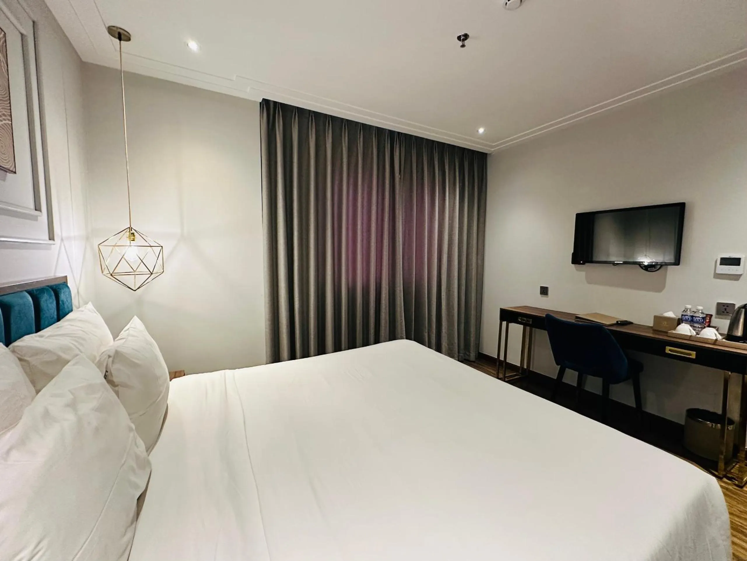 Bed in Adela Boutique Hotel - Infinity Pool