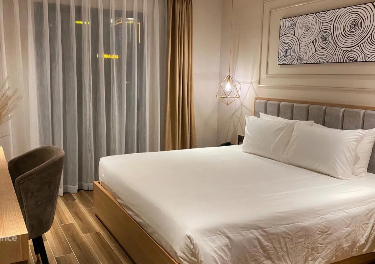 Bed in Adela Boutique Hotel - Infinity Pool