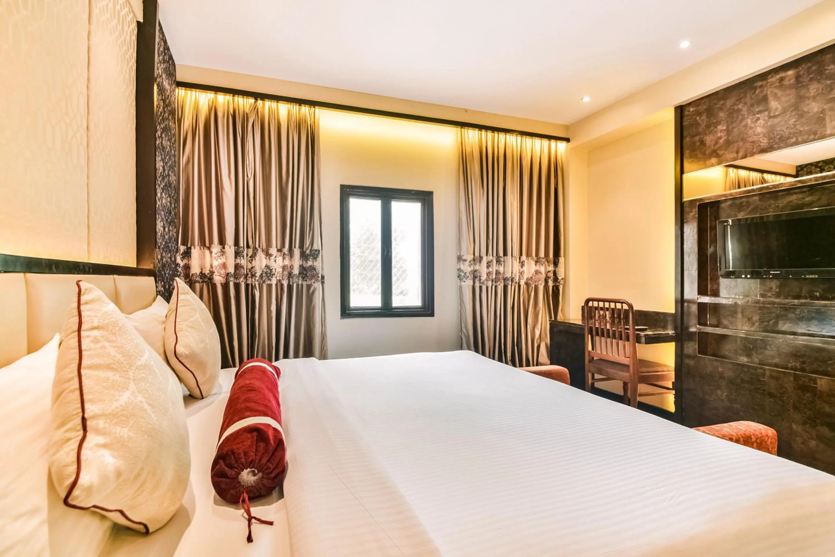 Photo of the whole room, Bed in HOTEL MENAAL RESIDENCY