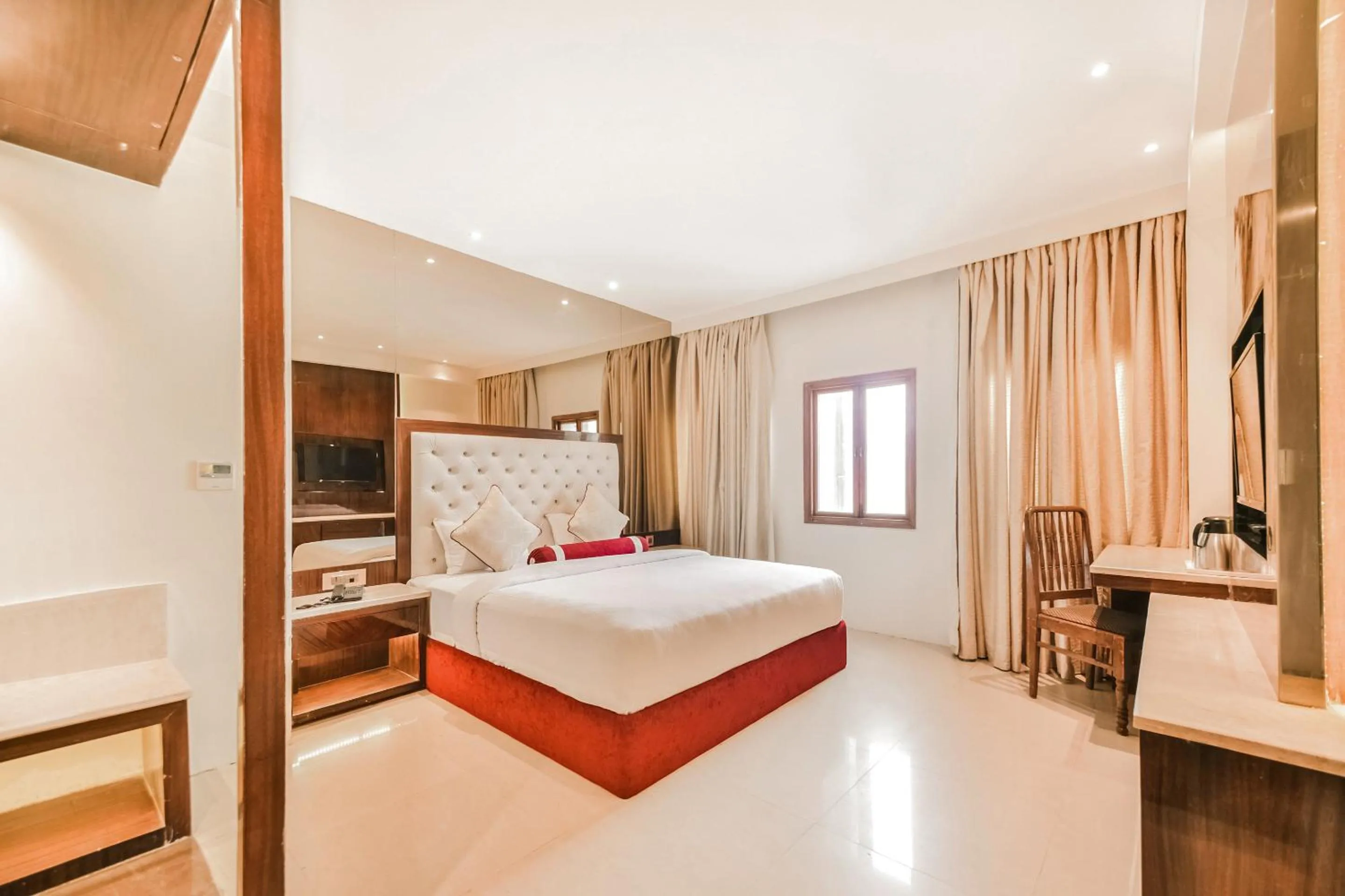 Photo of the whole room, Bed in HOTEL MENAAL RESIDENCY