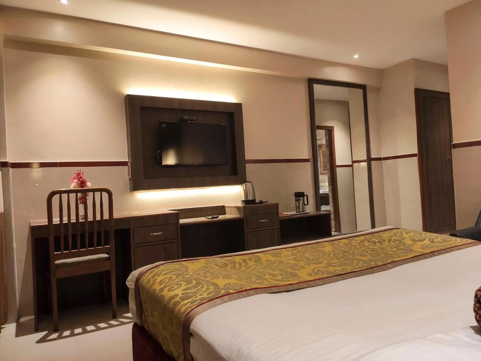Photo of the whole room, Bed in HOTEL MENAAL RESIDENCY