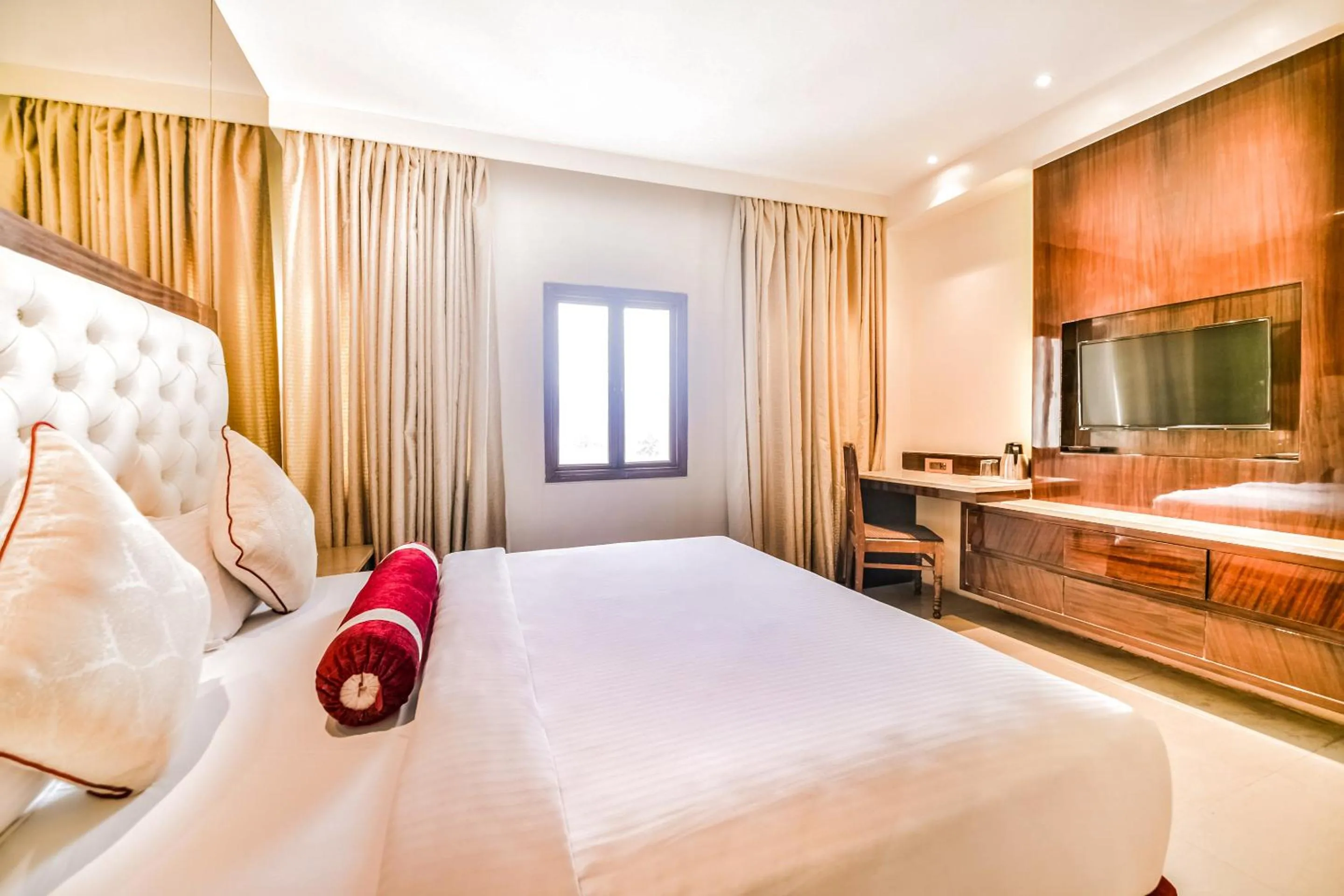 Photo of the whole room, Bed in HOTEL MENAAL RESIDENCY