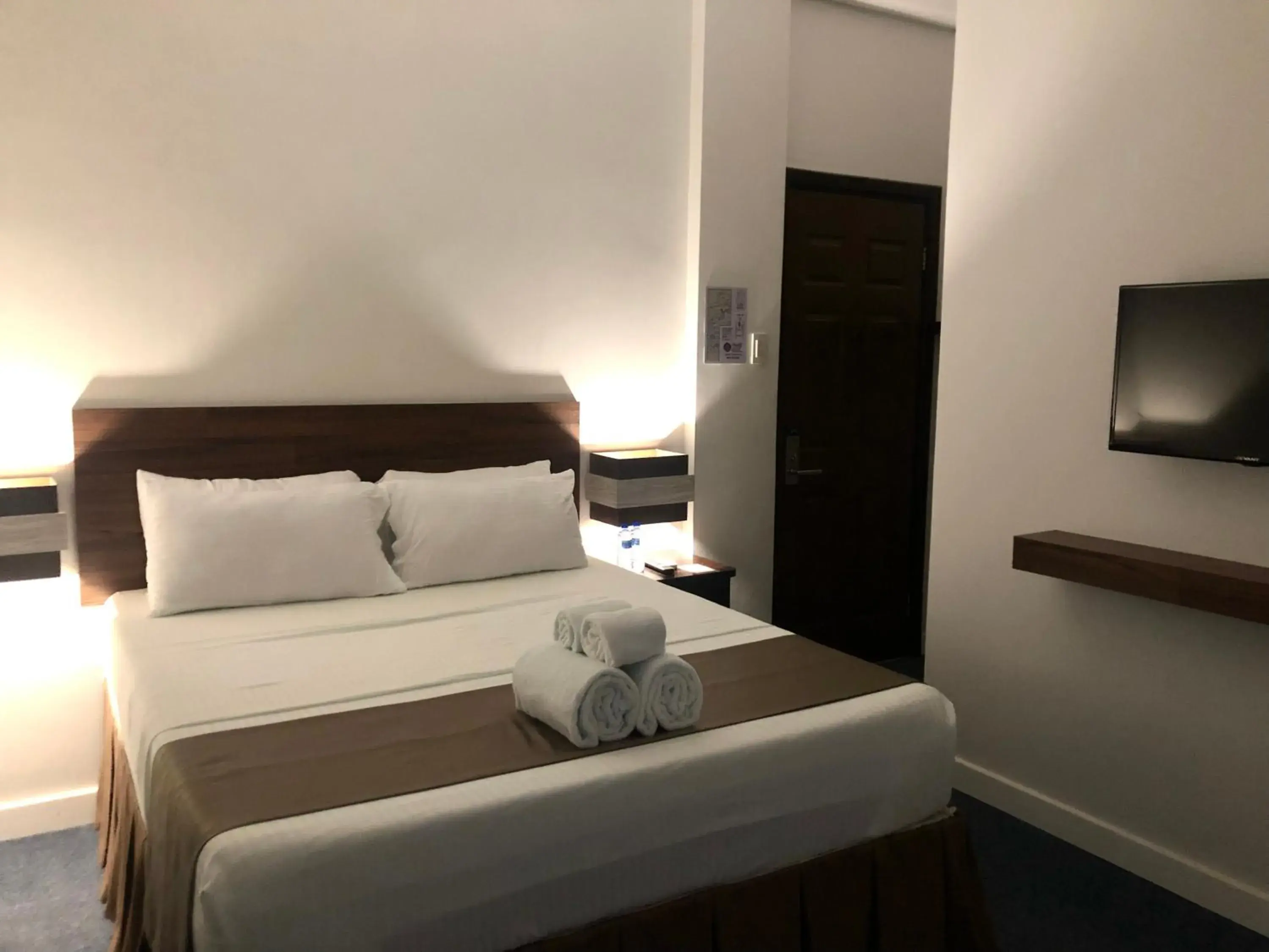 Bed in Seacliff Suites Hotel and Resort Bed in Seacliff Suites Hotel and Resort