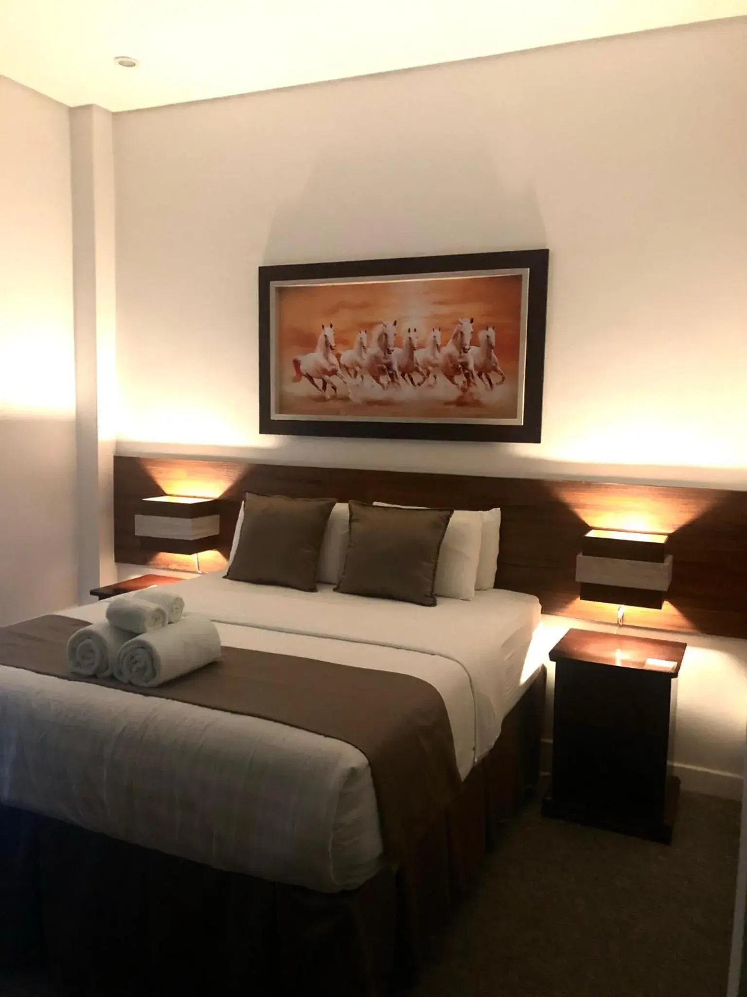 Bed in Seacliff Suites Hotel and Resort Bed in Seacliff Suites Hotel and Resort