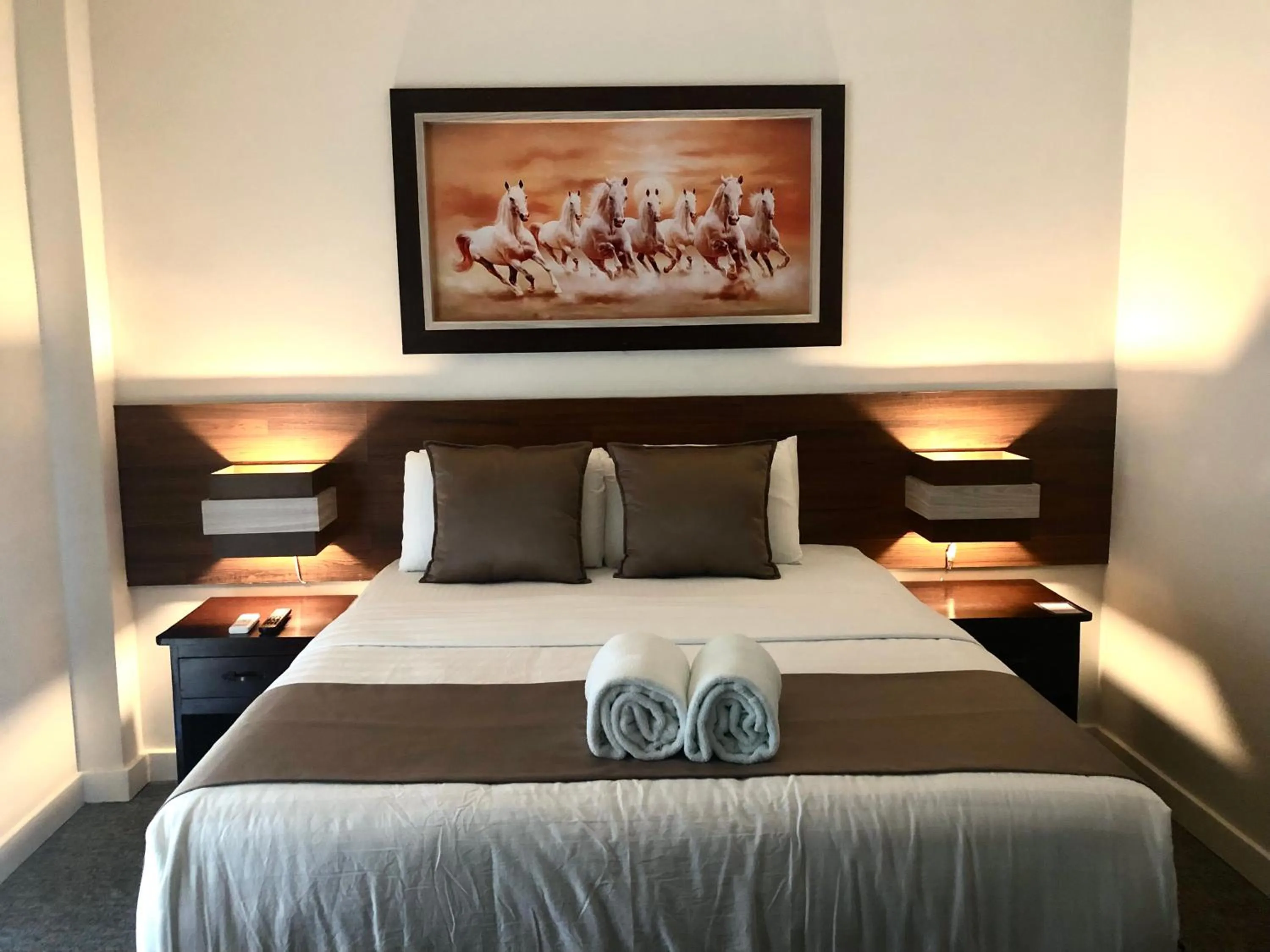 Bed in Seacliff Suites Hotel and Resort