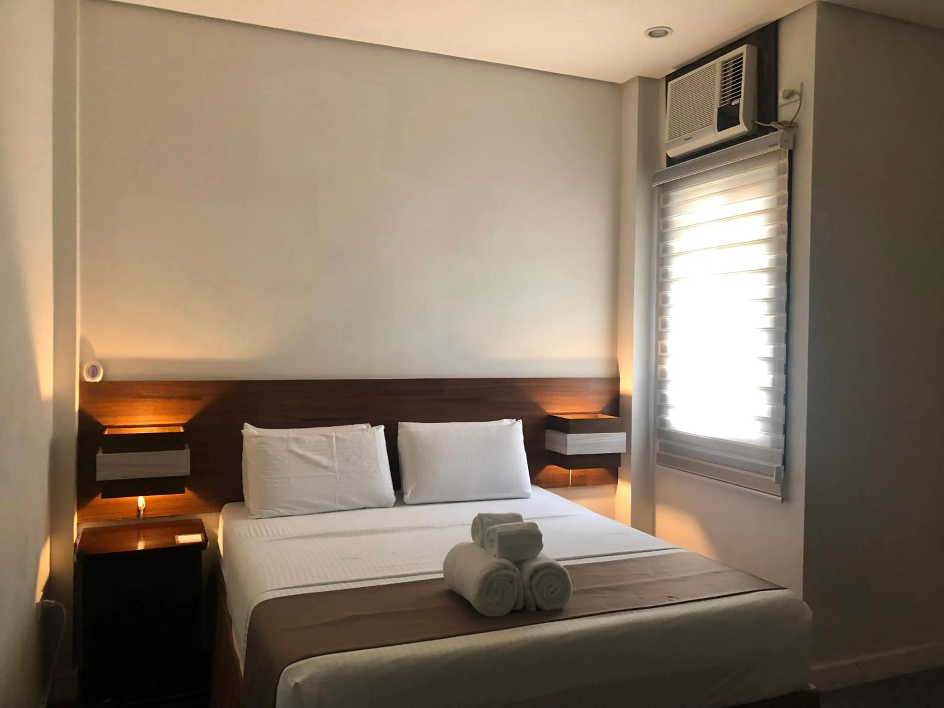 Bed in Seacliff Suites Hotel and Resort