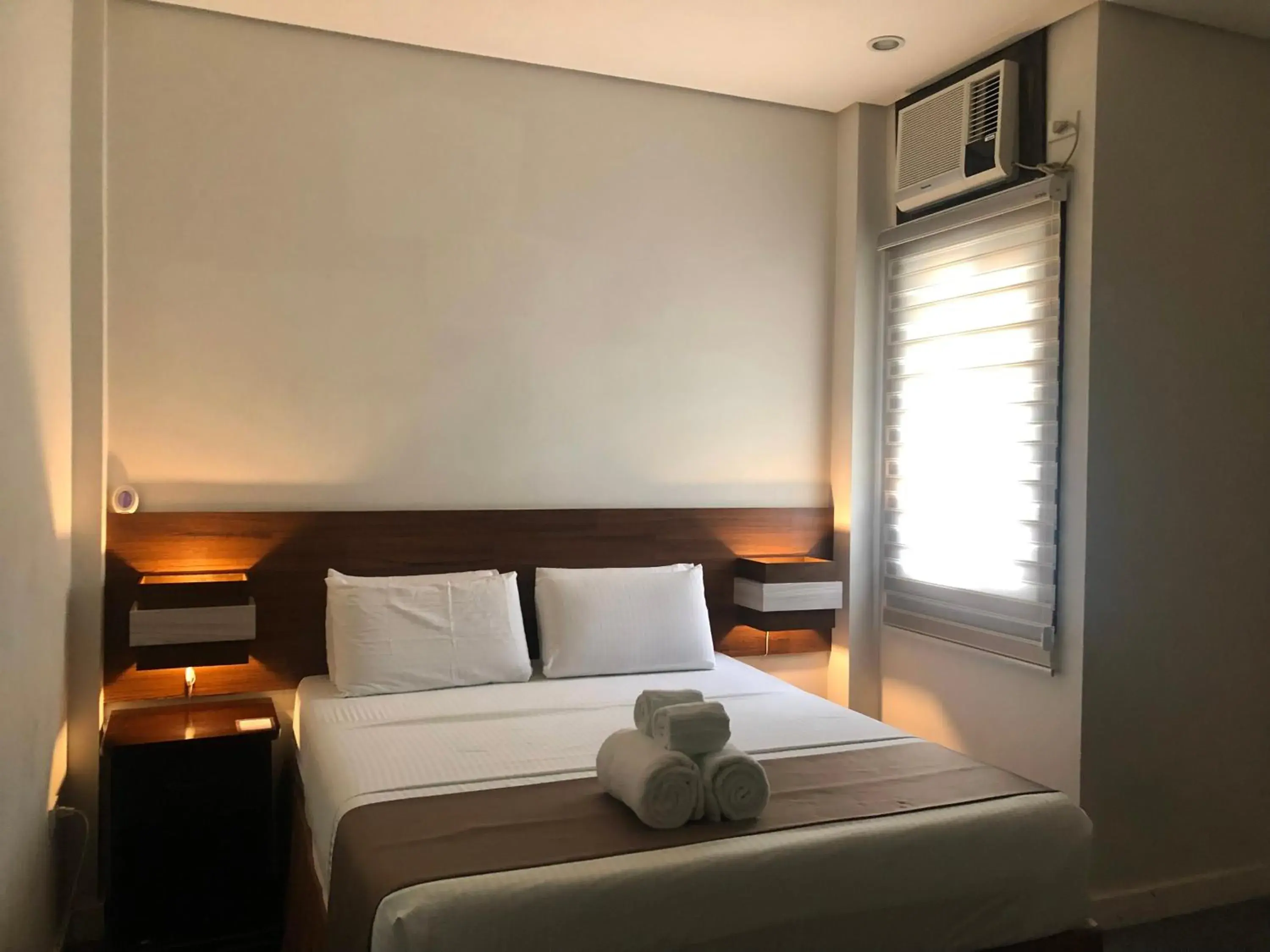 Bed in Seacliff Suites Hotel and Resort Bed in Seacliff Suites Hotel and Resort