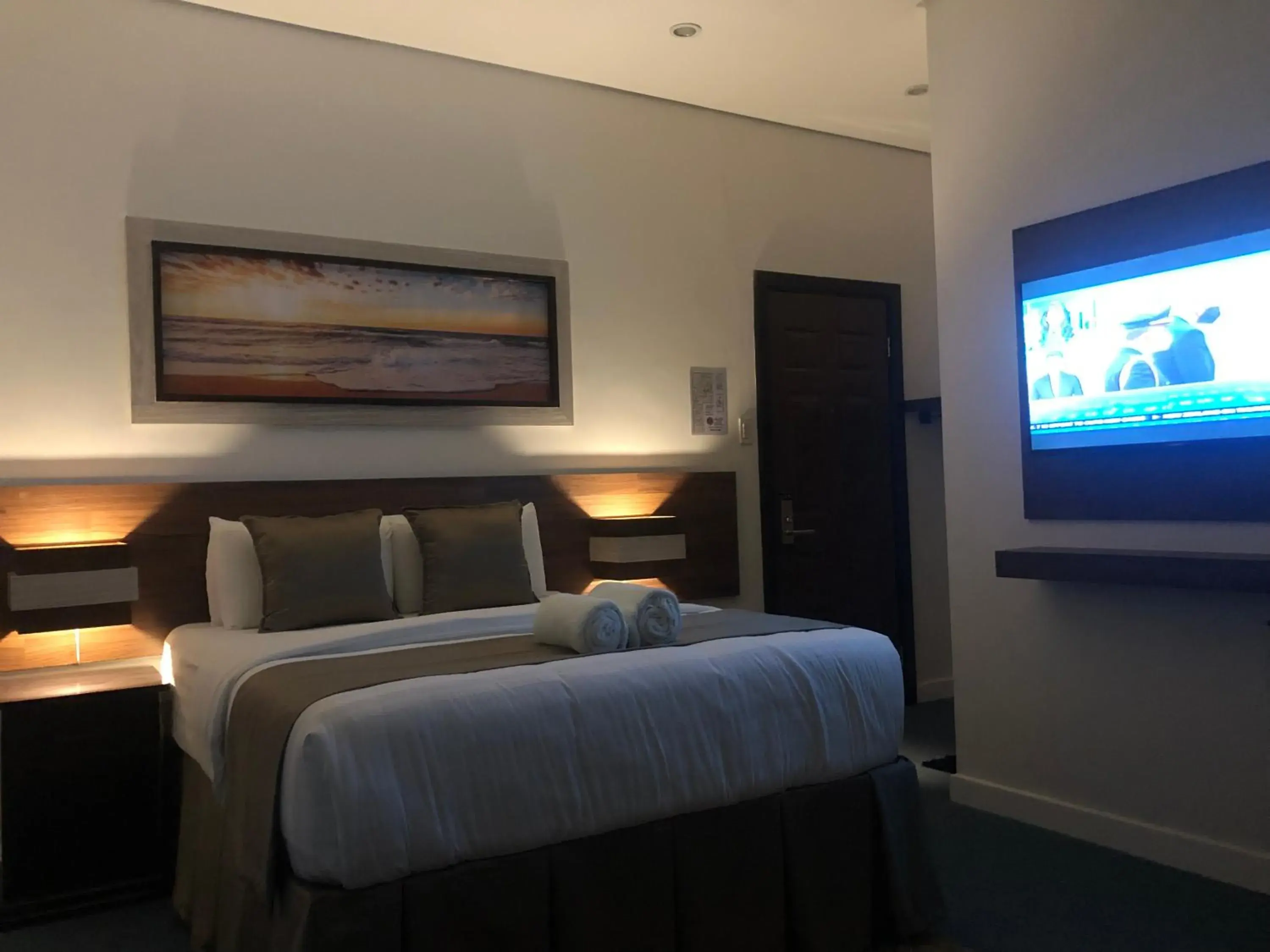 Bed in Seacliff Suites Hotel and Resort Bed in Seacliff Suites Hotel and Resort