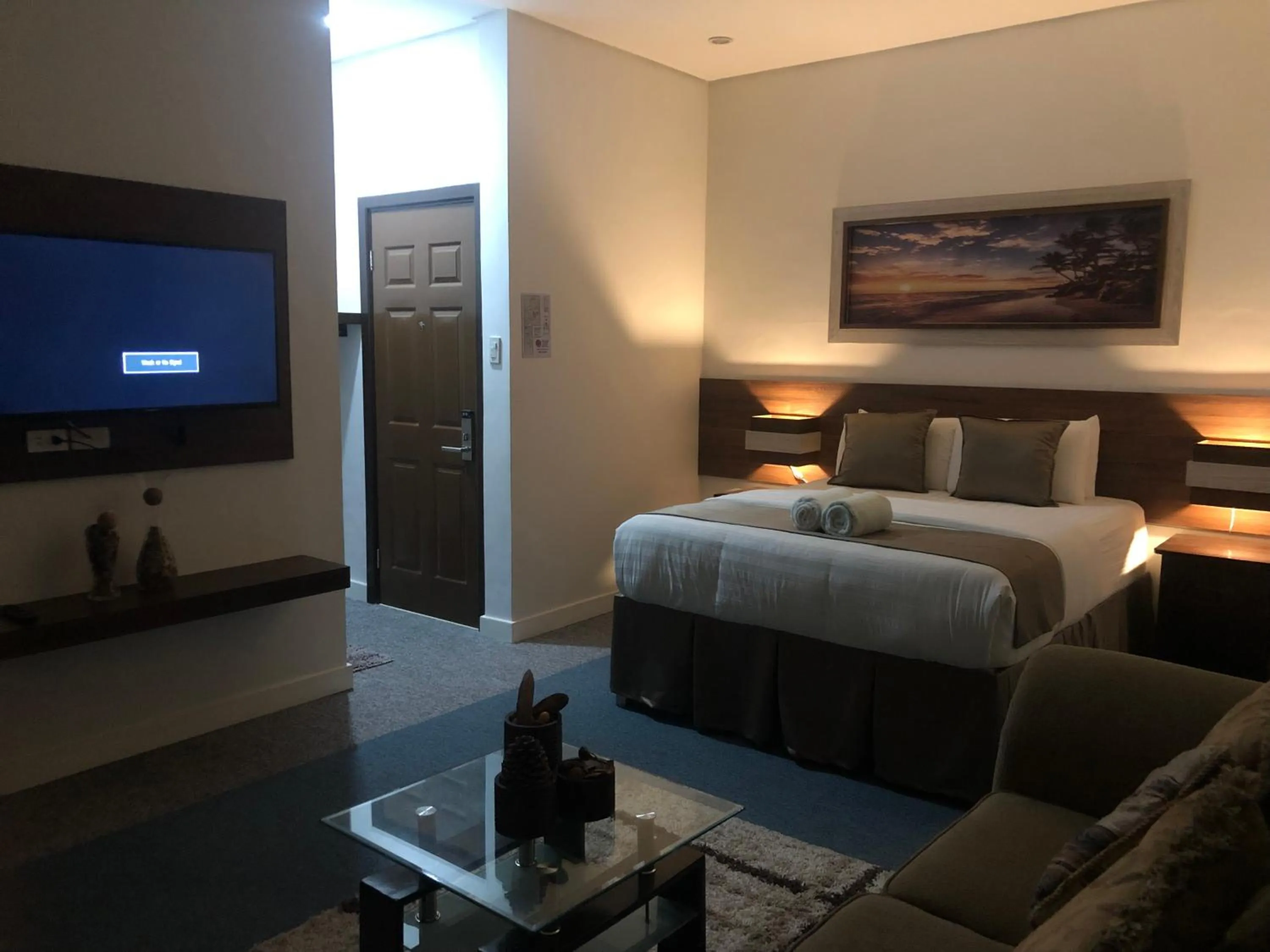 Bed in Seacliff Suites Hotel and Resort