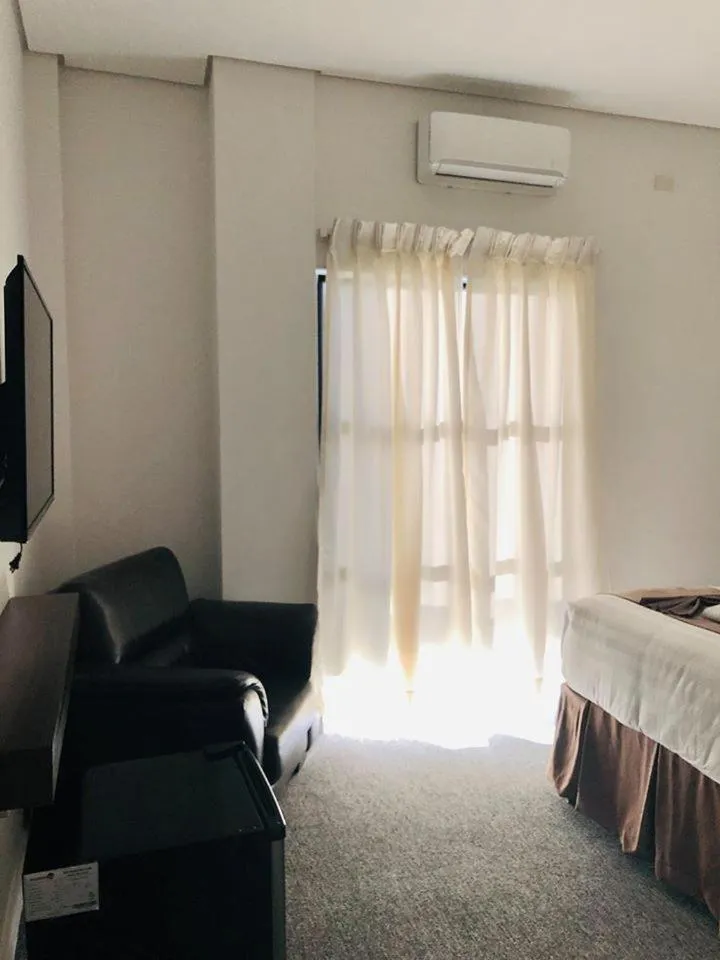 Bed in Seacliff Suites Hotel and Resort