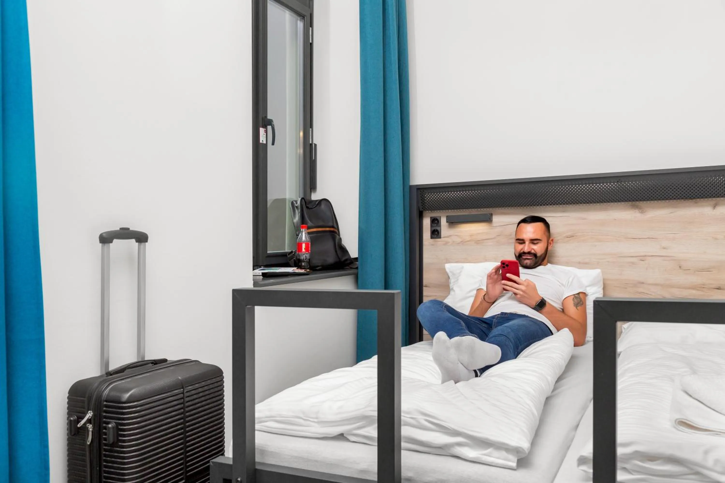 Photo of the whole room, Bed in a&o Budapest City