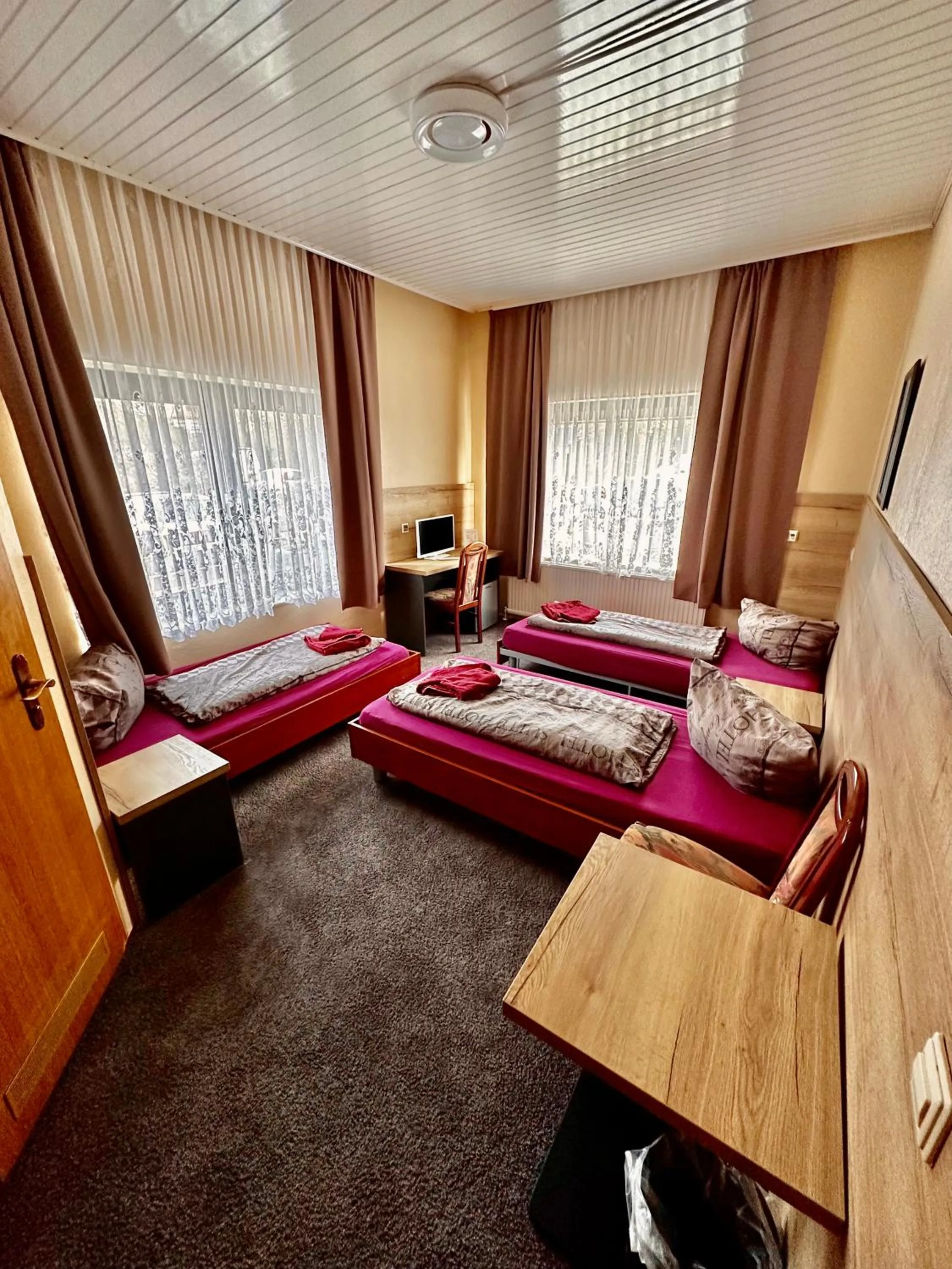 Bed in Hotel Pension Pamina