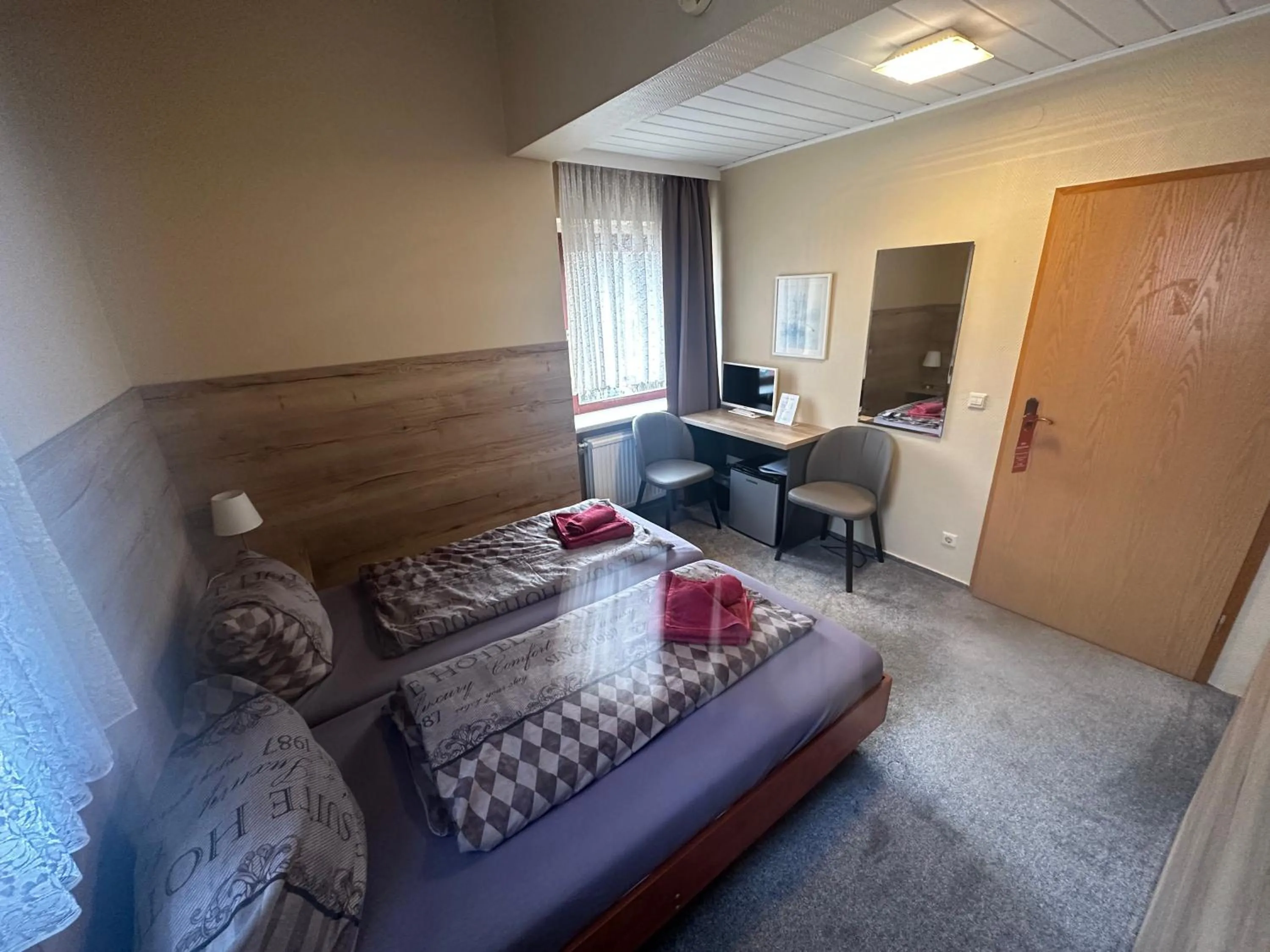 Bed in Hotel Pension Pamina