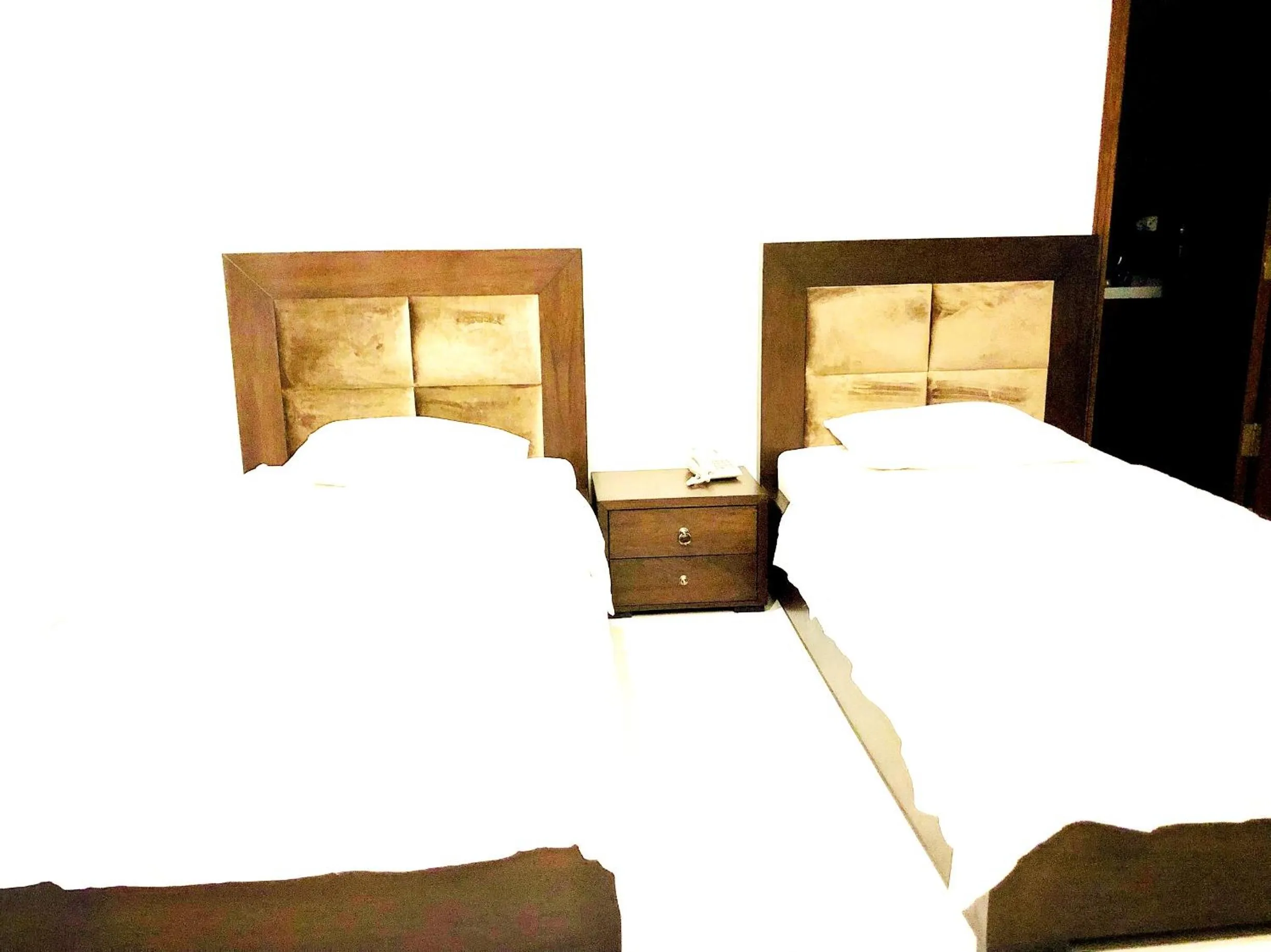 Bedroom in Jade Dragon Hotel DHA Lahore