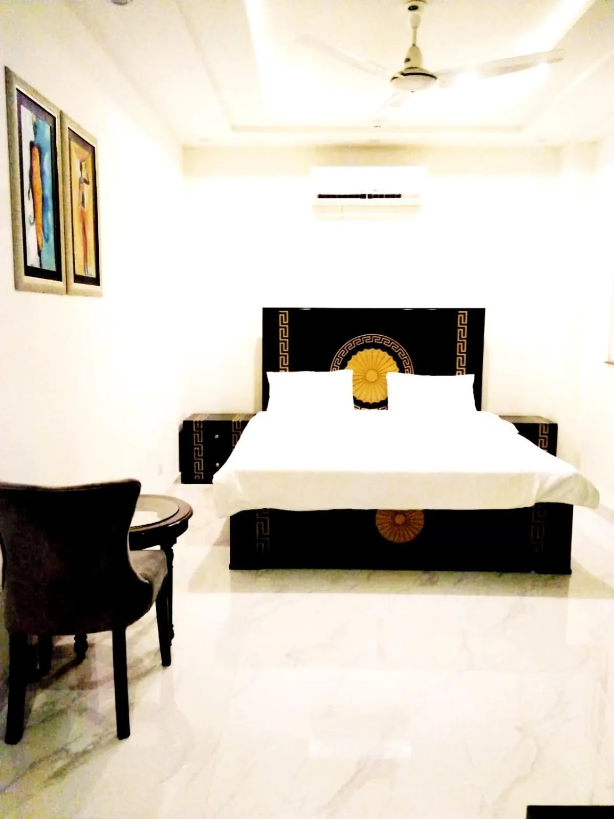 Bedroom in Jade Dragon Hotel DHA Lahore