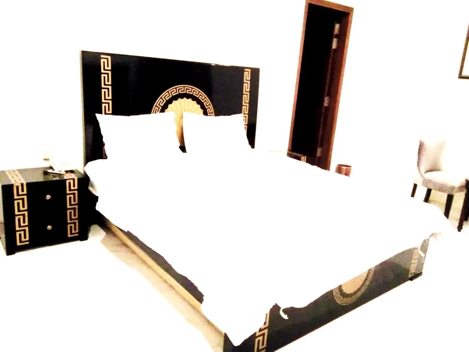 Bedroom in Jade Dragon Hotel DHA Lahore