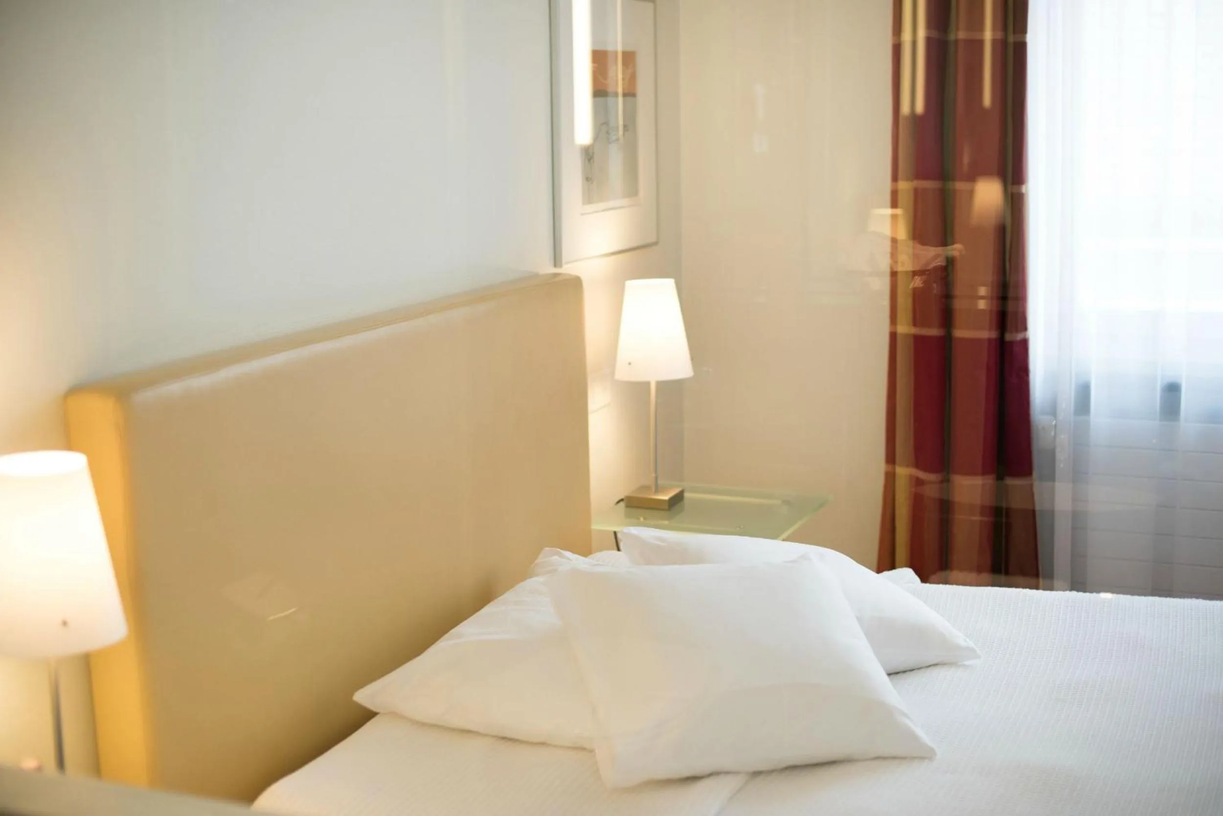 Photo of the whole room, Bed in Hotel Glockenhof Zürich