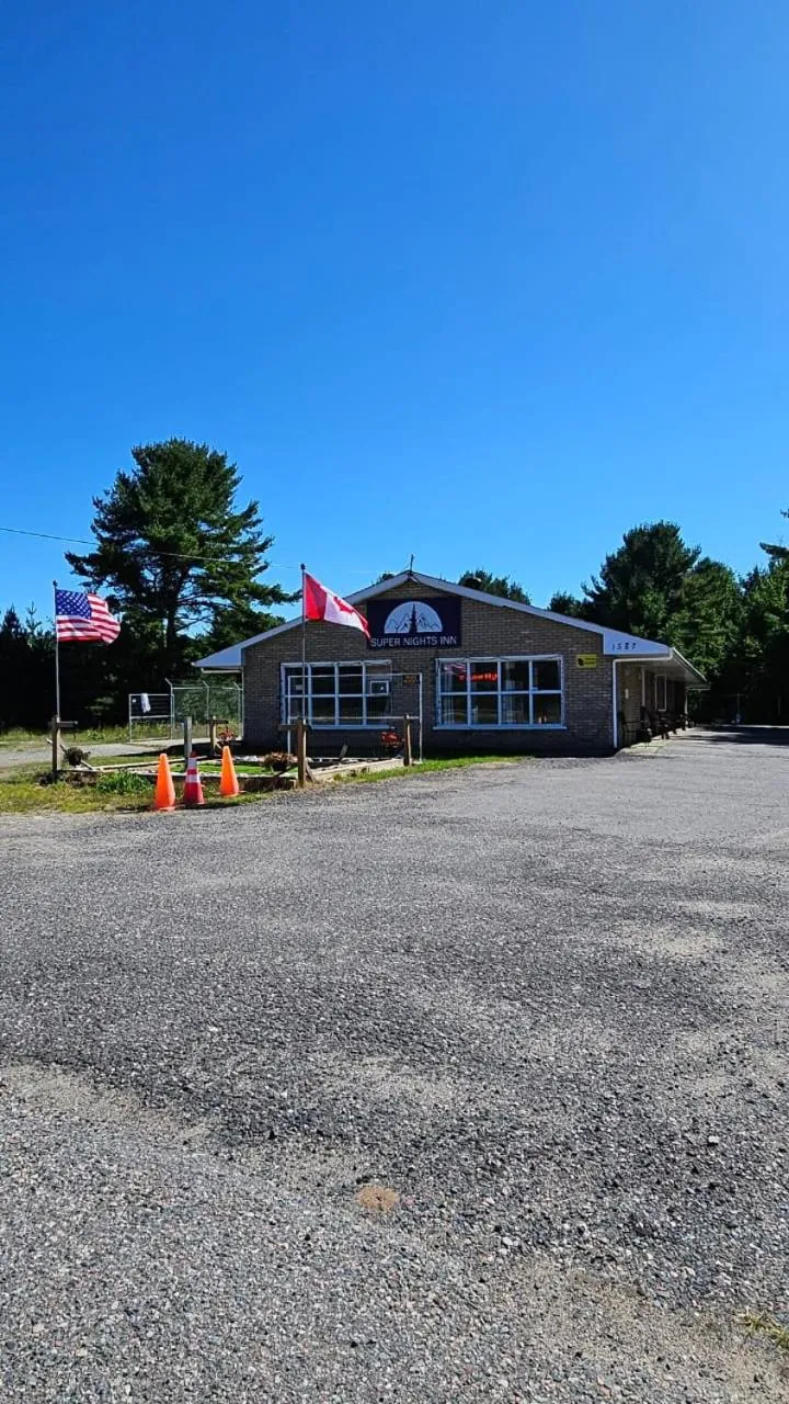 Property building in Super Nights Inn