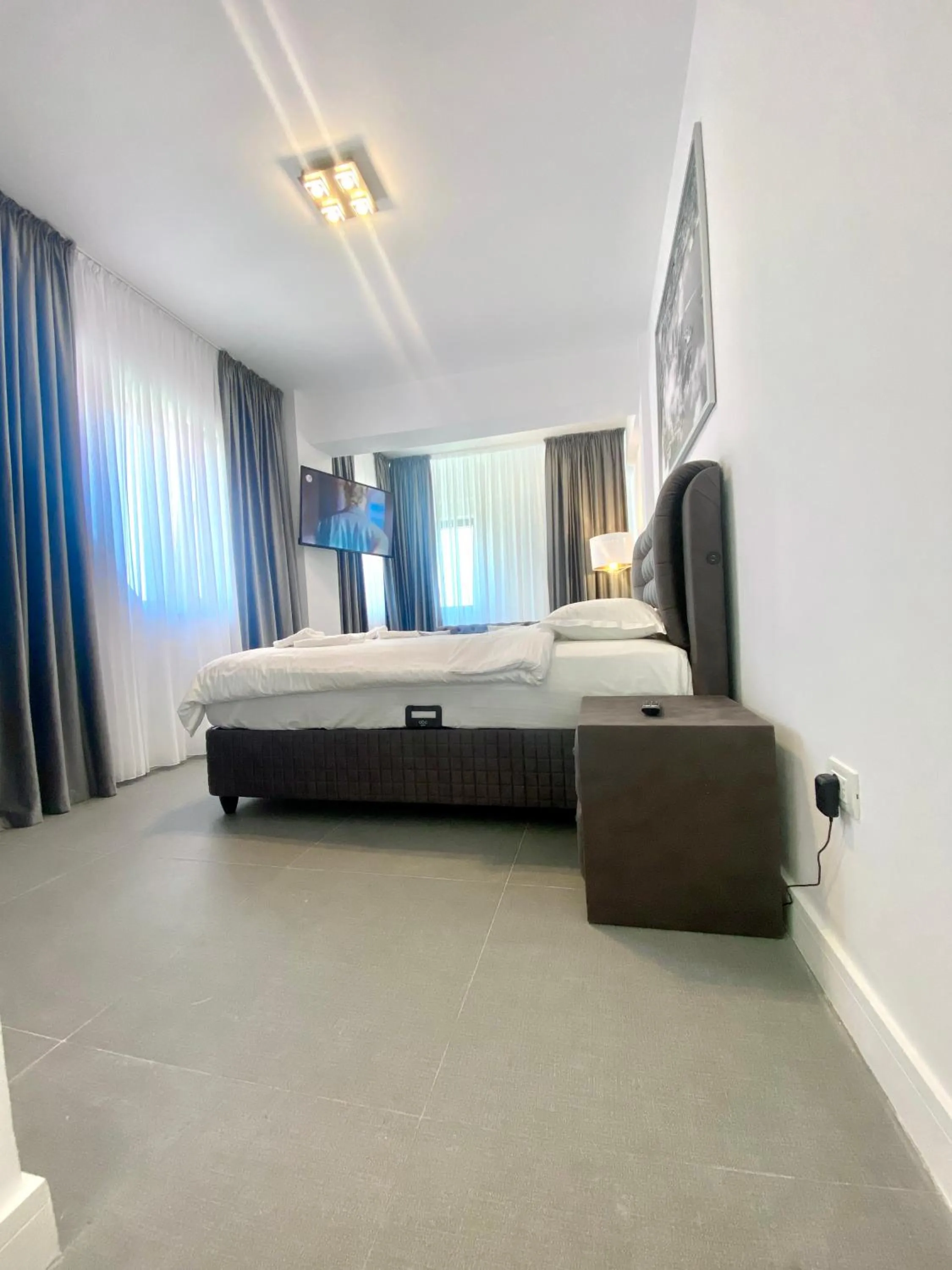 Bed in Enjoy Life Apartments