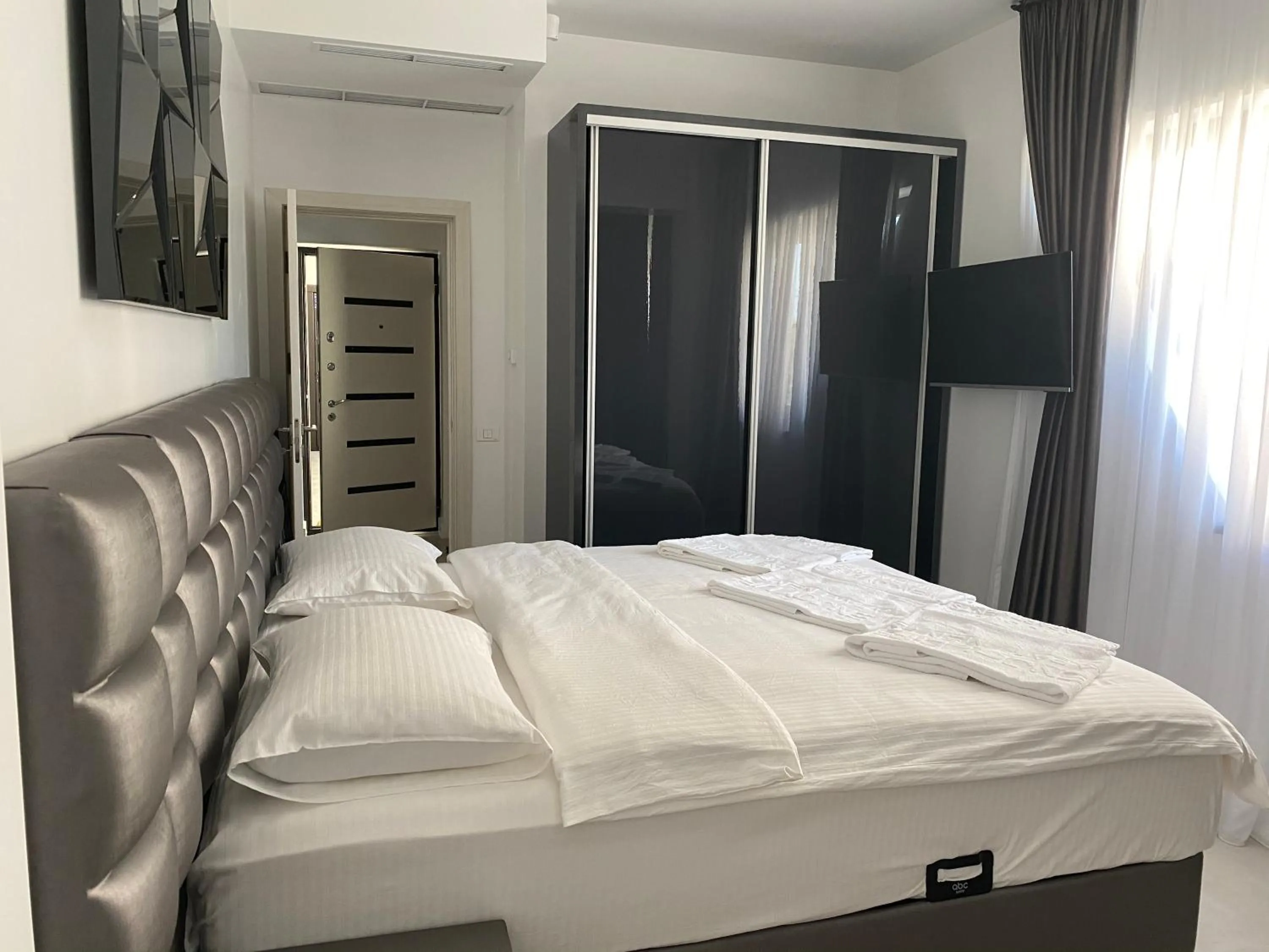 Bed in Enjoy Life Apartments