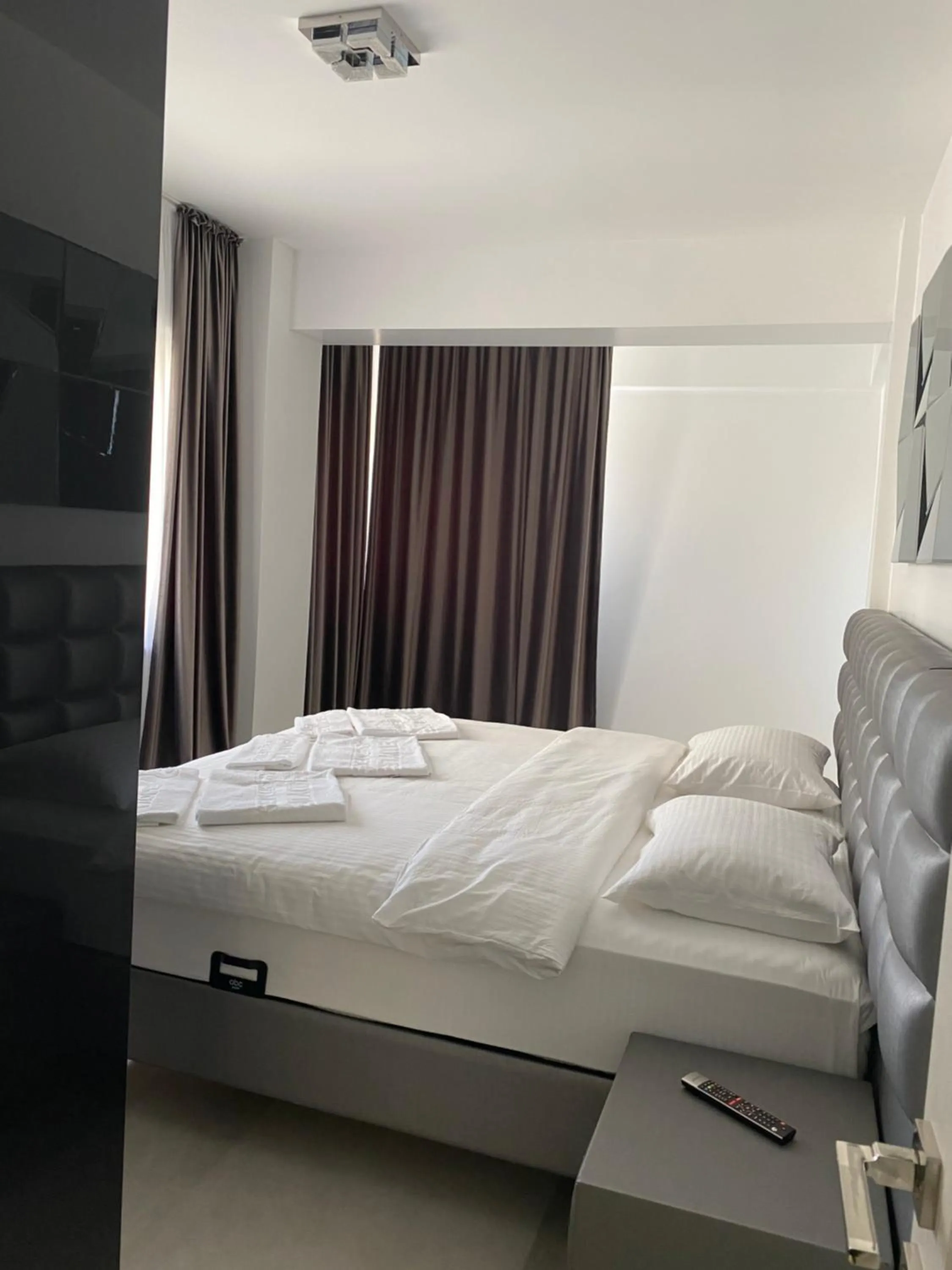 Bed in Enjoy Life Apartments