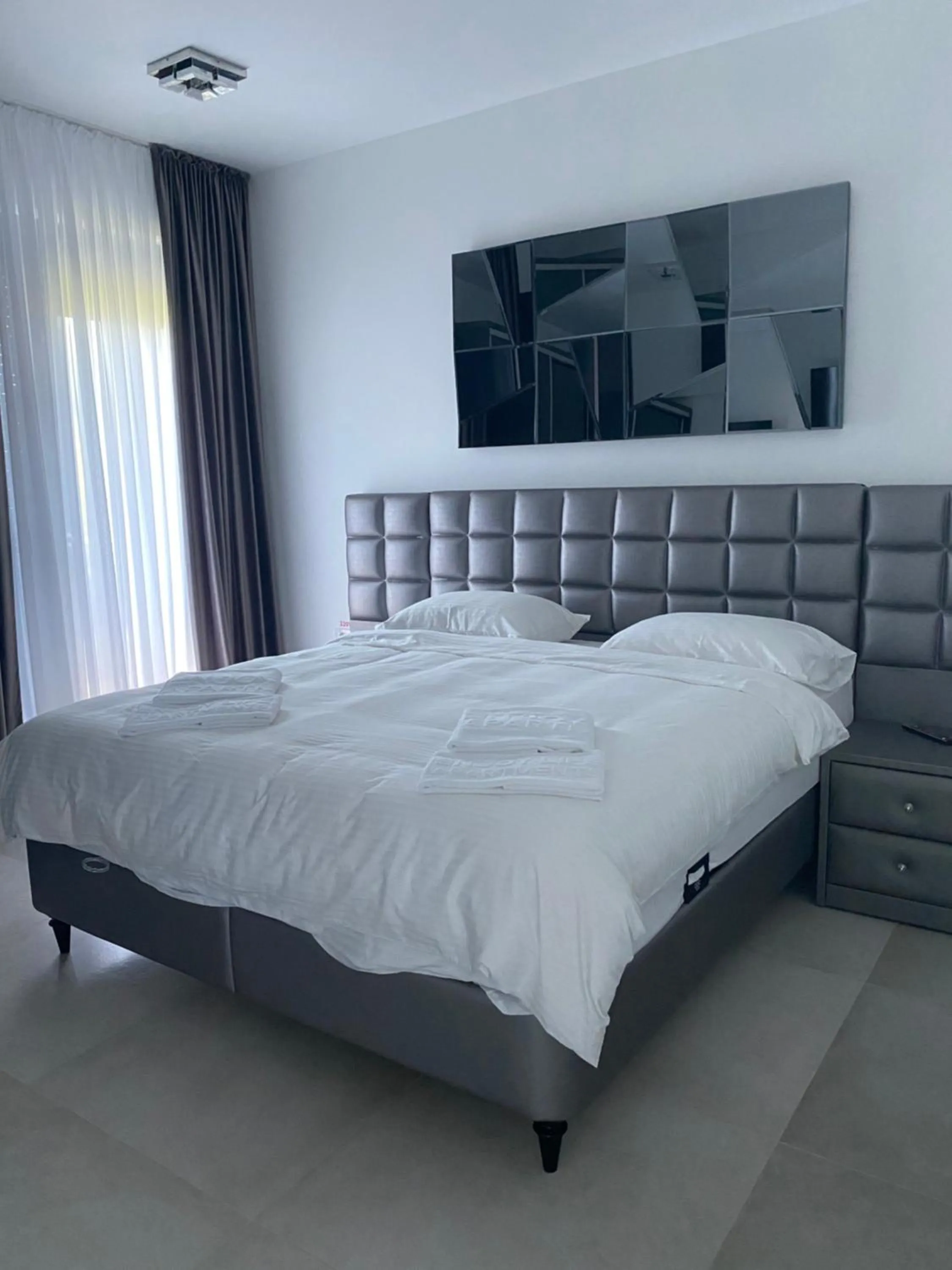 Bed in Enjoy Life Apartments