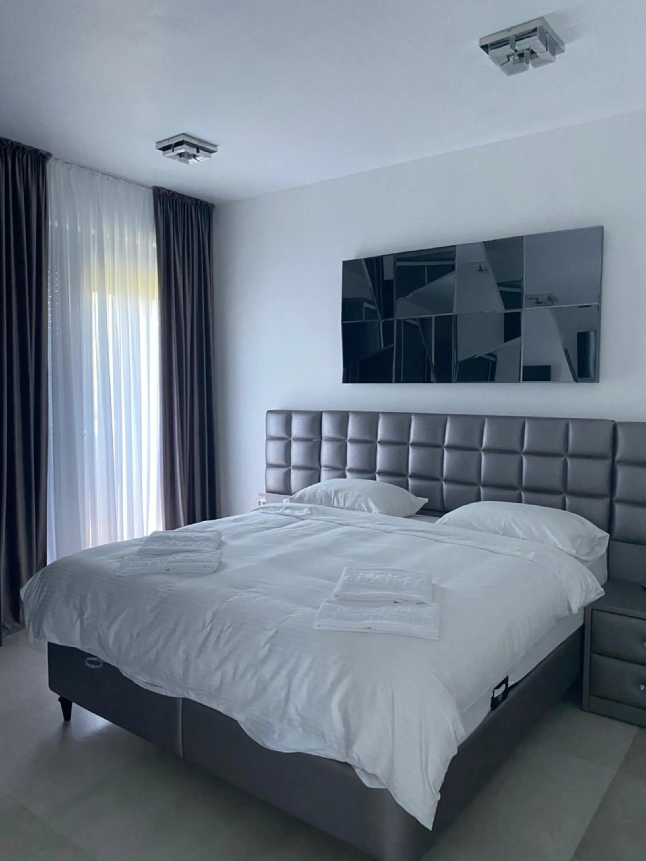 Bed in Enjoy Life Apartments