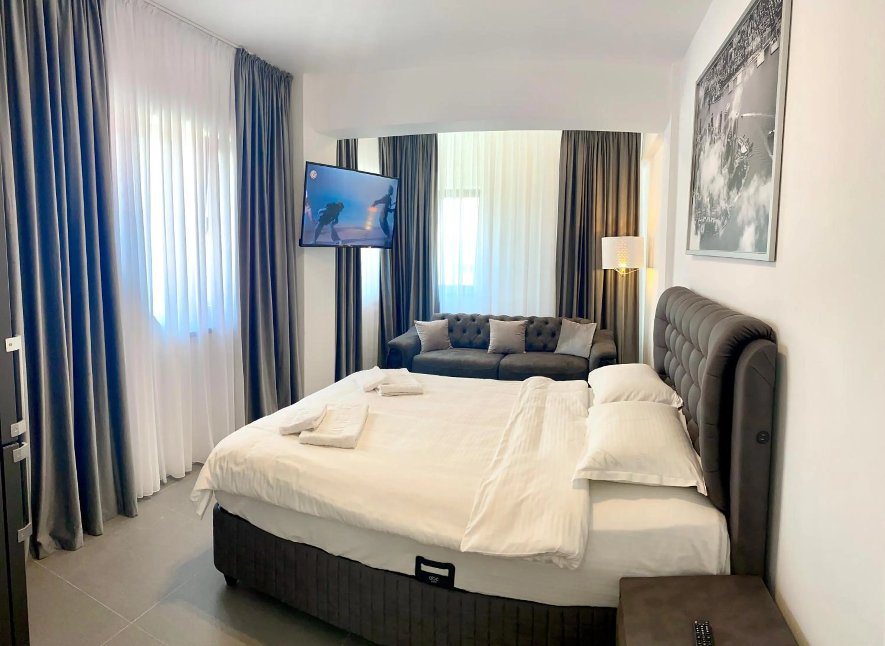 Bed in Enjoy Life Apartments