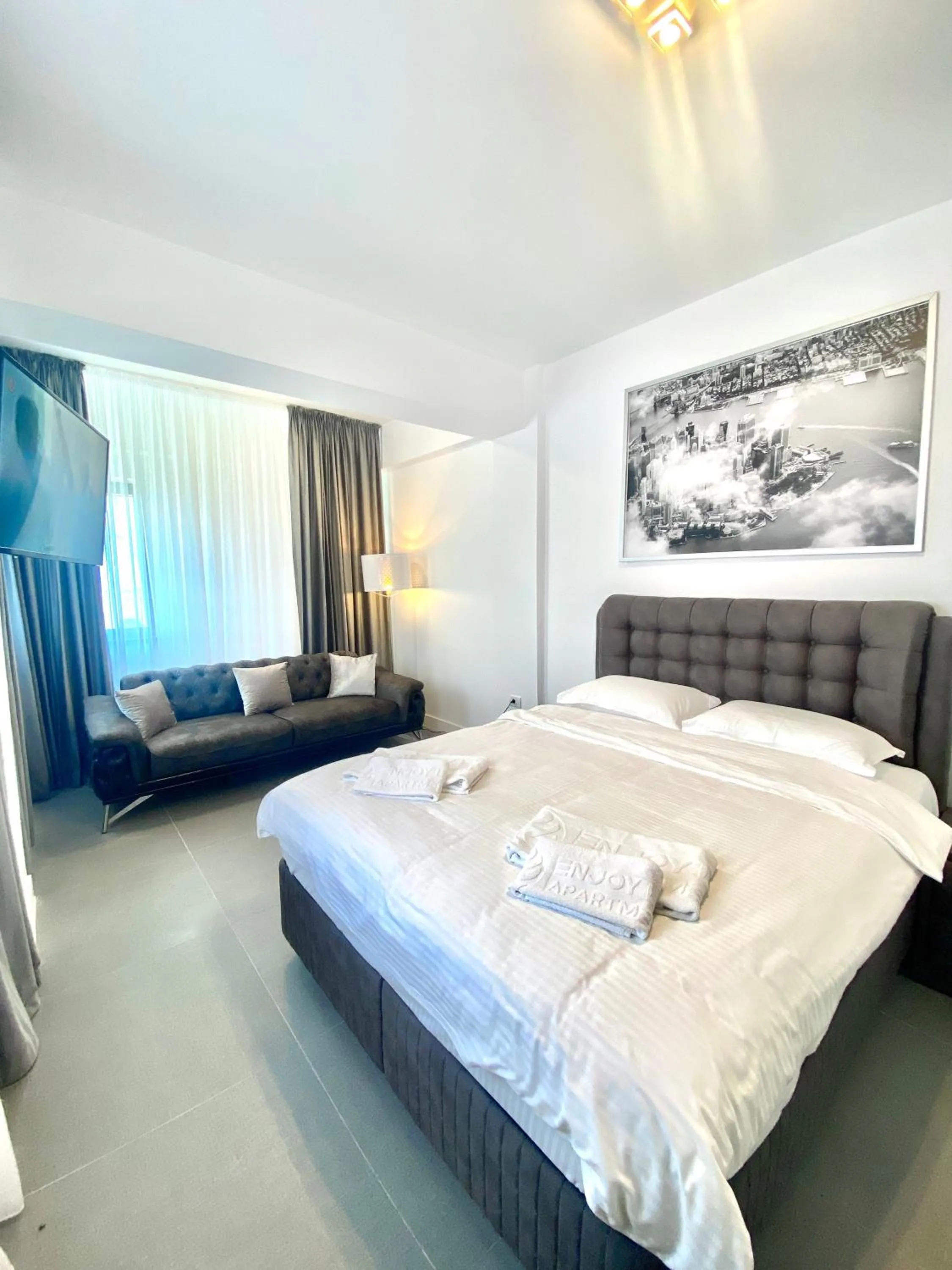 Bed in Enjoy Life Apartments