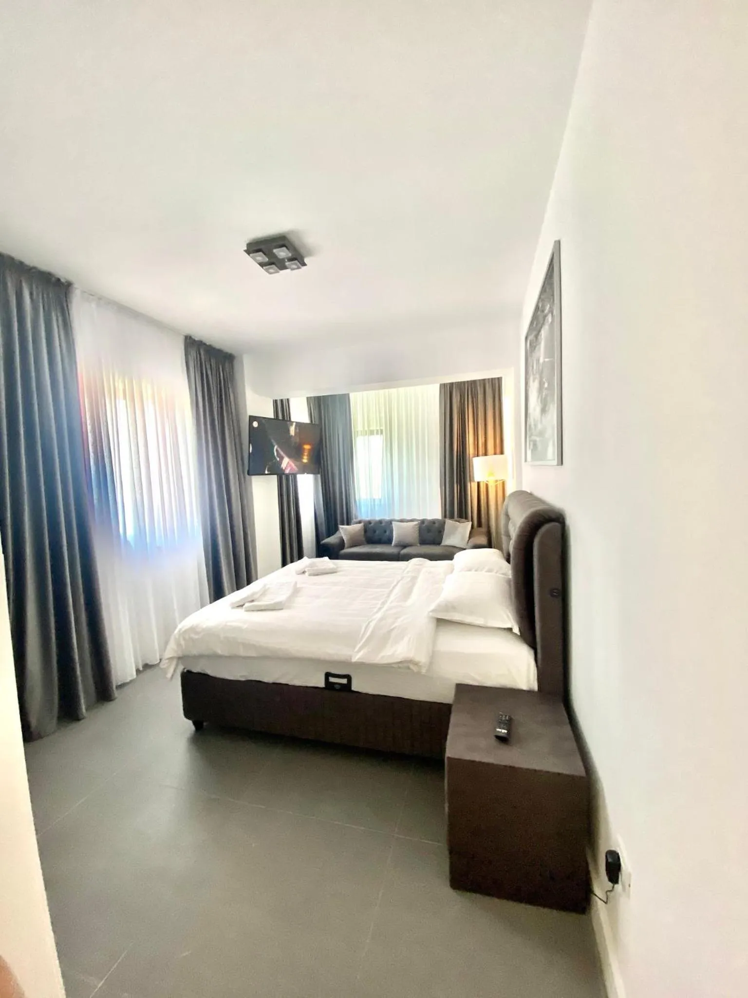 Bed in Enjoy Life Apartments