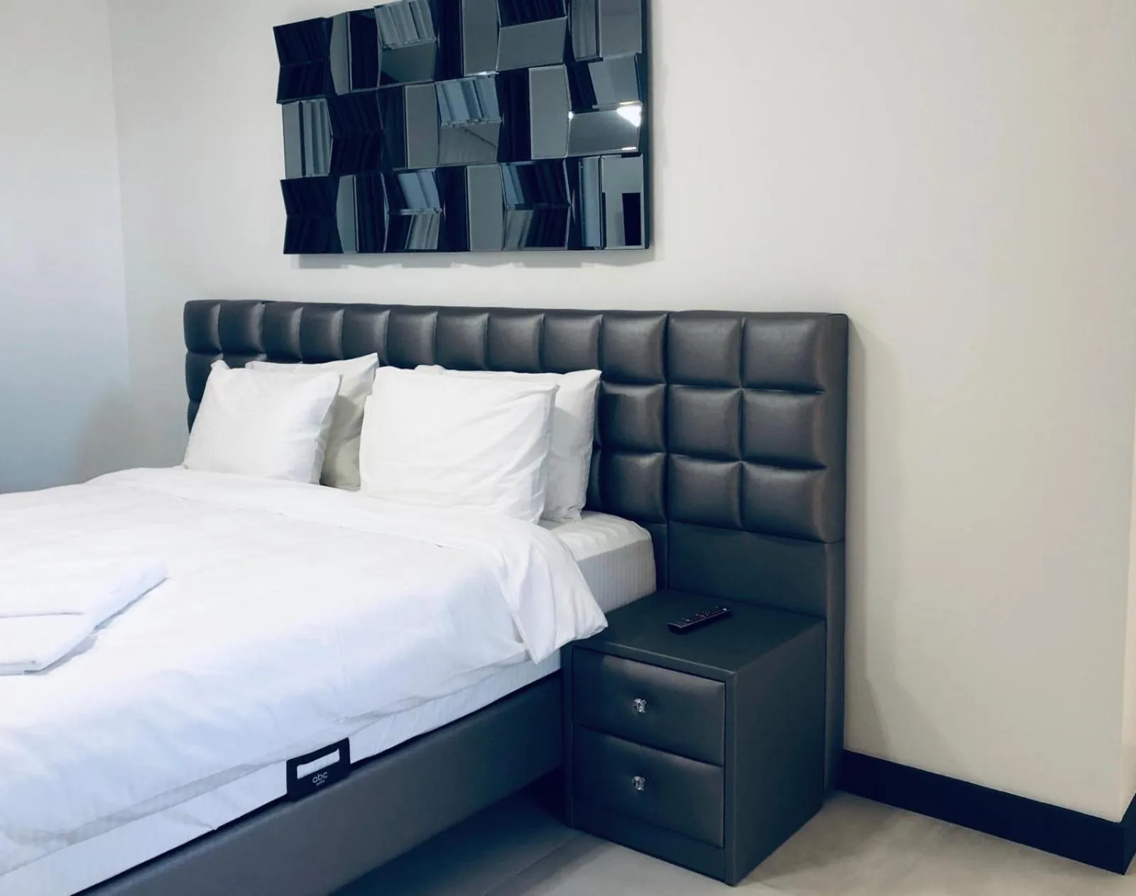 Bed in Enjoy Life Apartments