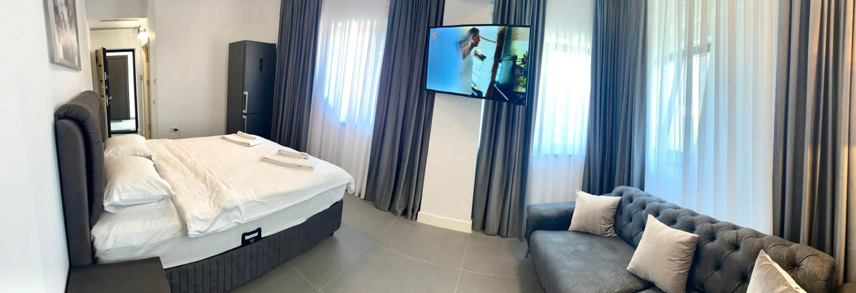 Bed in Enjoy Life Apartments