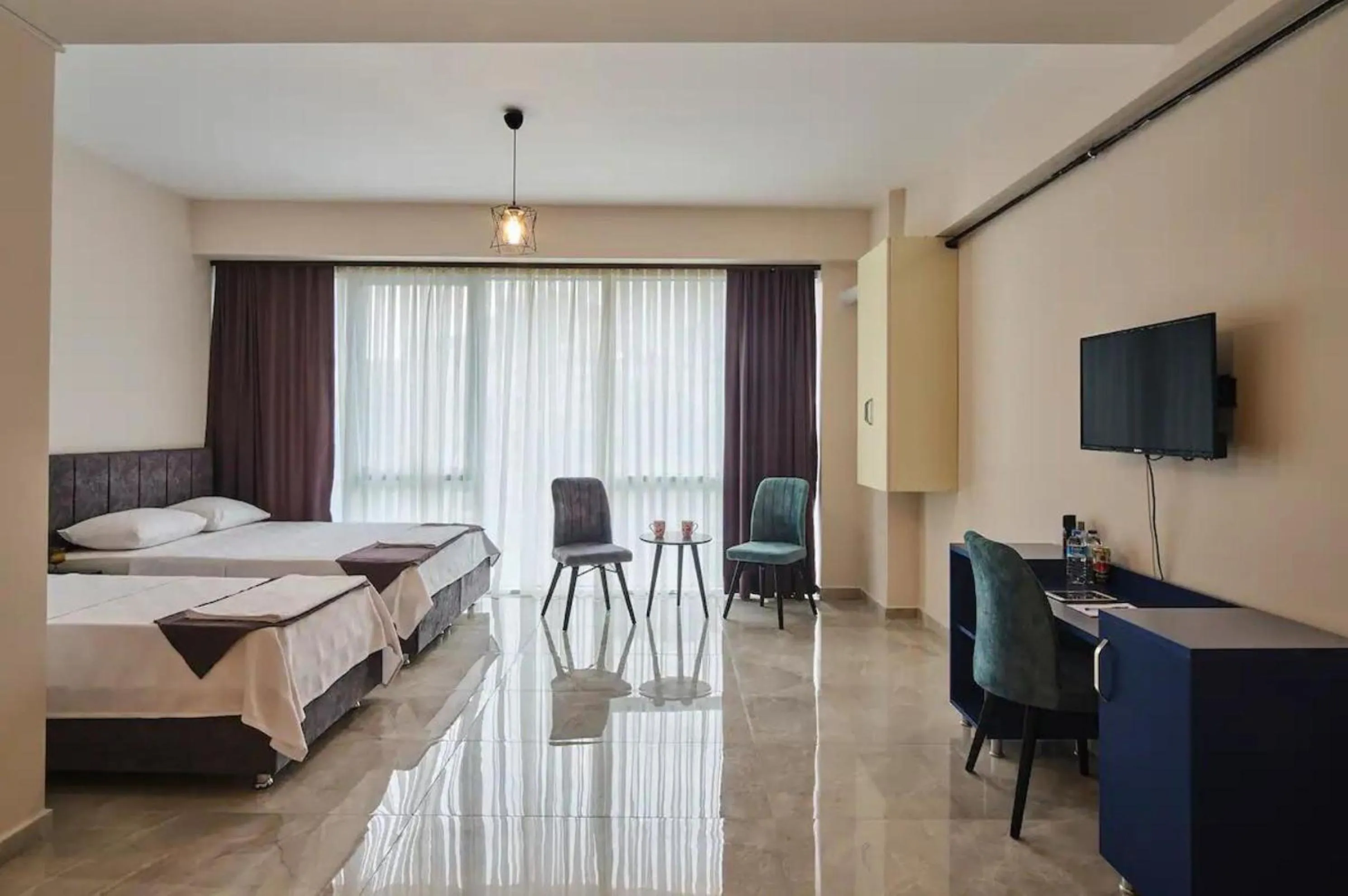 Bed in Mini Suite Otel