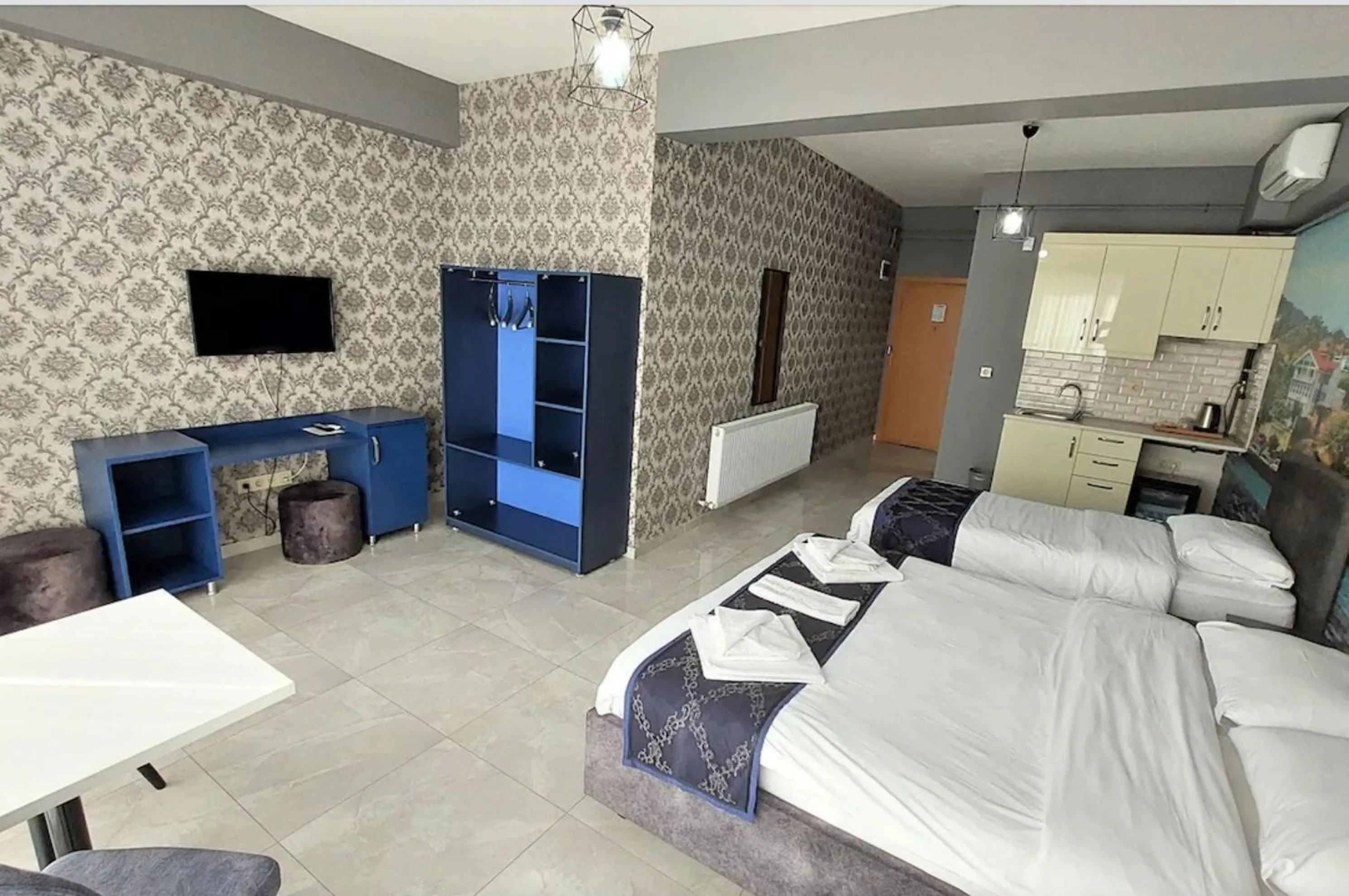 Bed in Mini Suite Otel