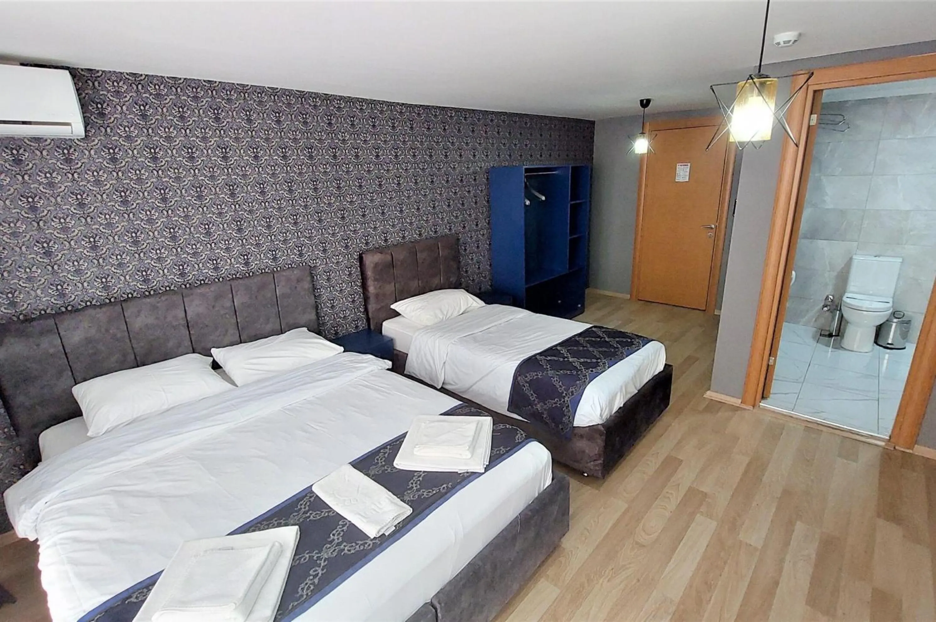 Bed in Mini Suite Otel
