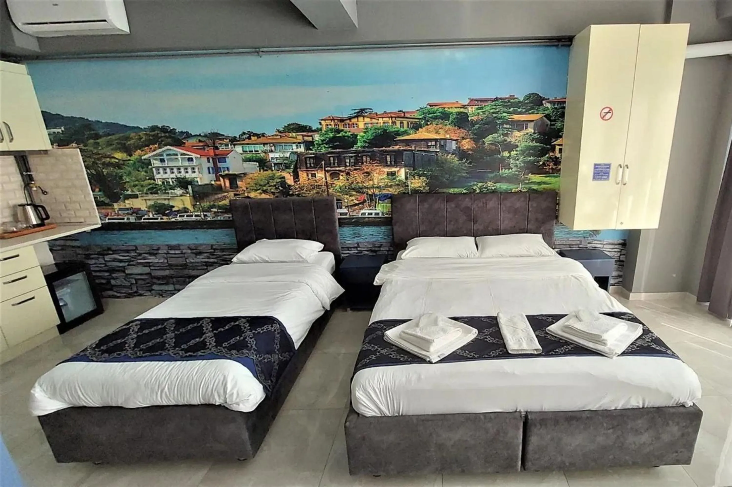 Bed in Mini Suite Otel