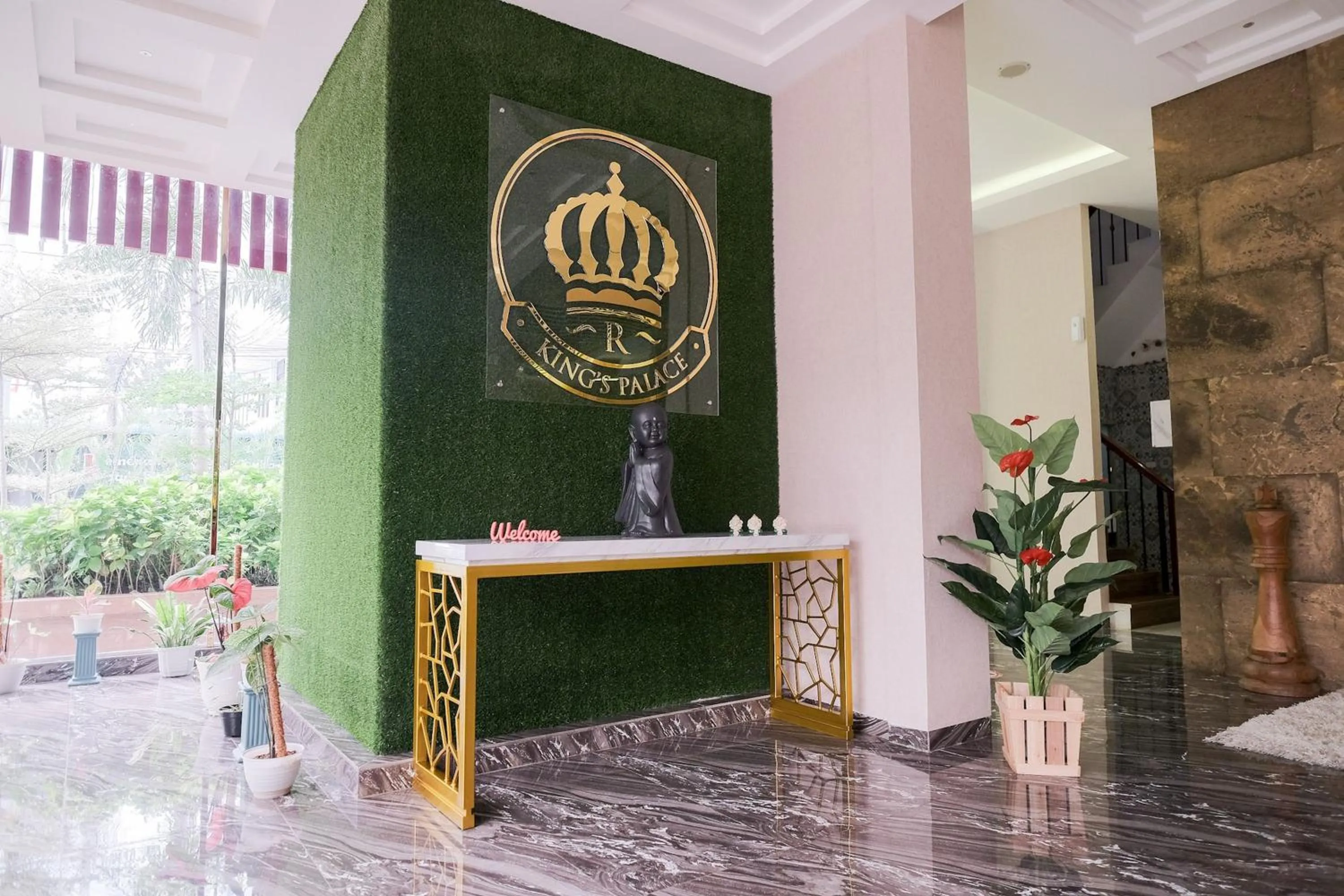 Property logo or sign in King's Palace Medan RedPartner