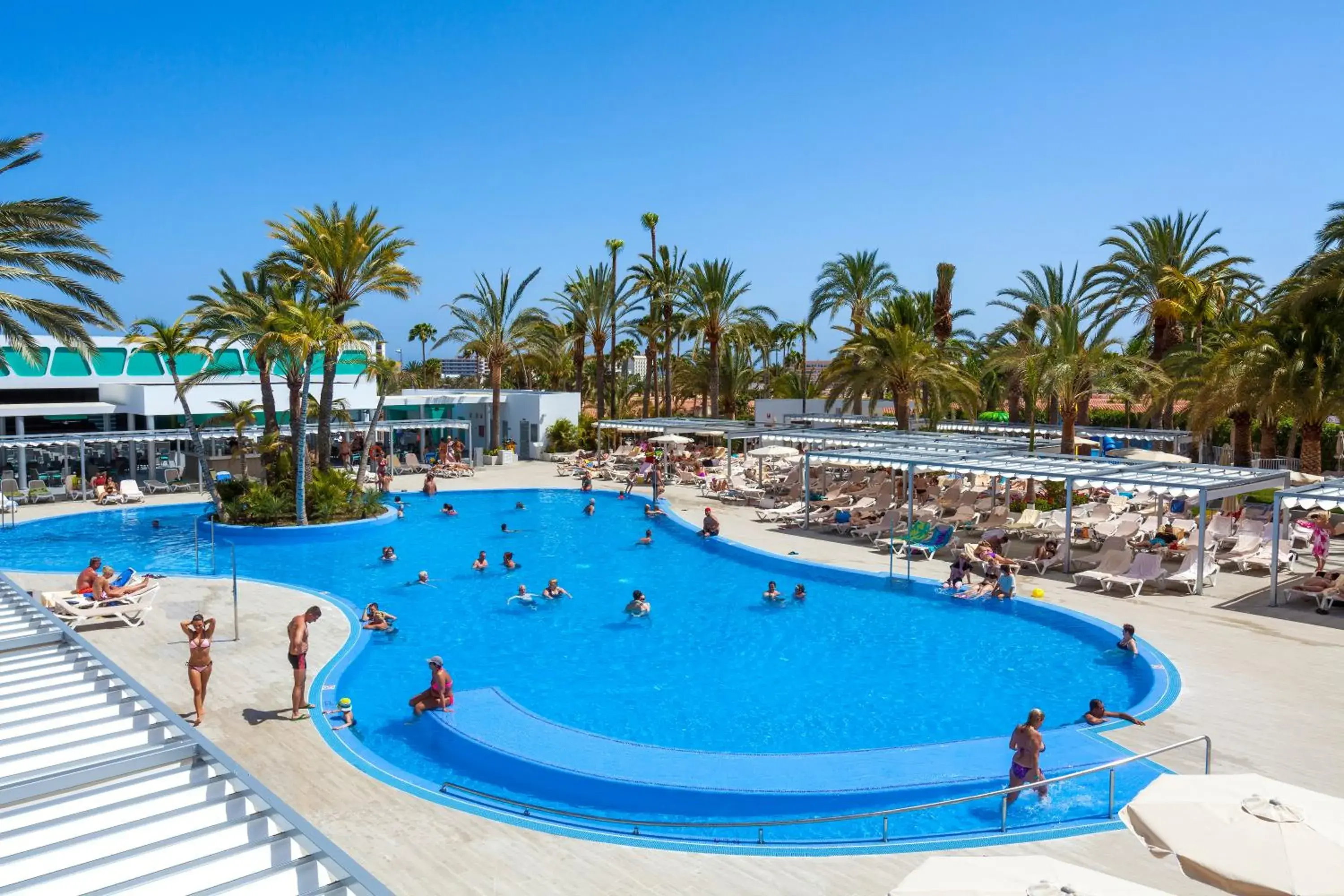 Swimming pool in Hotel Riu Papayas - All Inclusive Swimming pool in Hotel Riu Papayas - All Inclusive