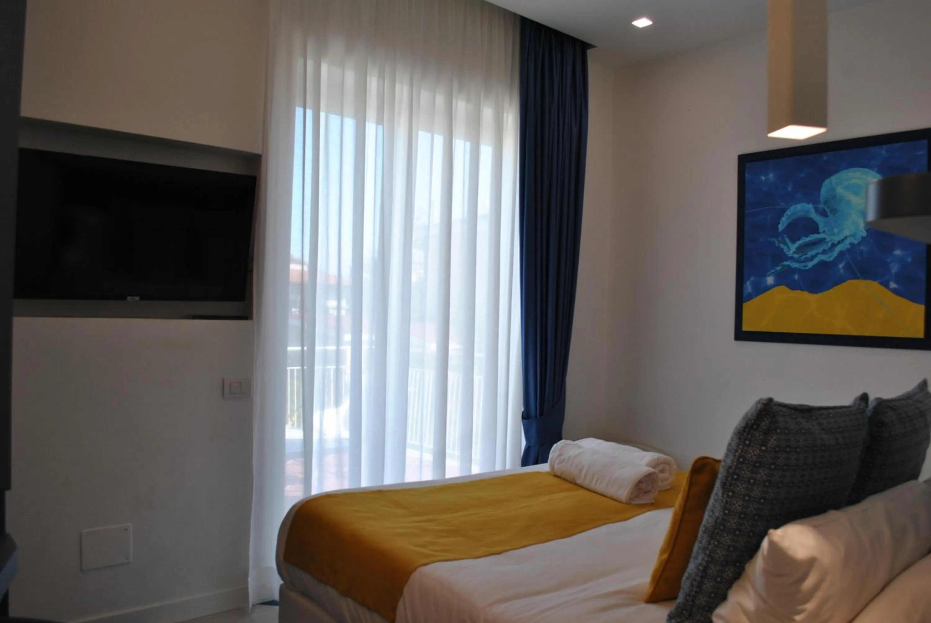 Bed in Villa Cettina Boutique Hotel