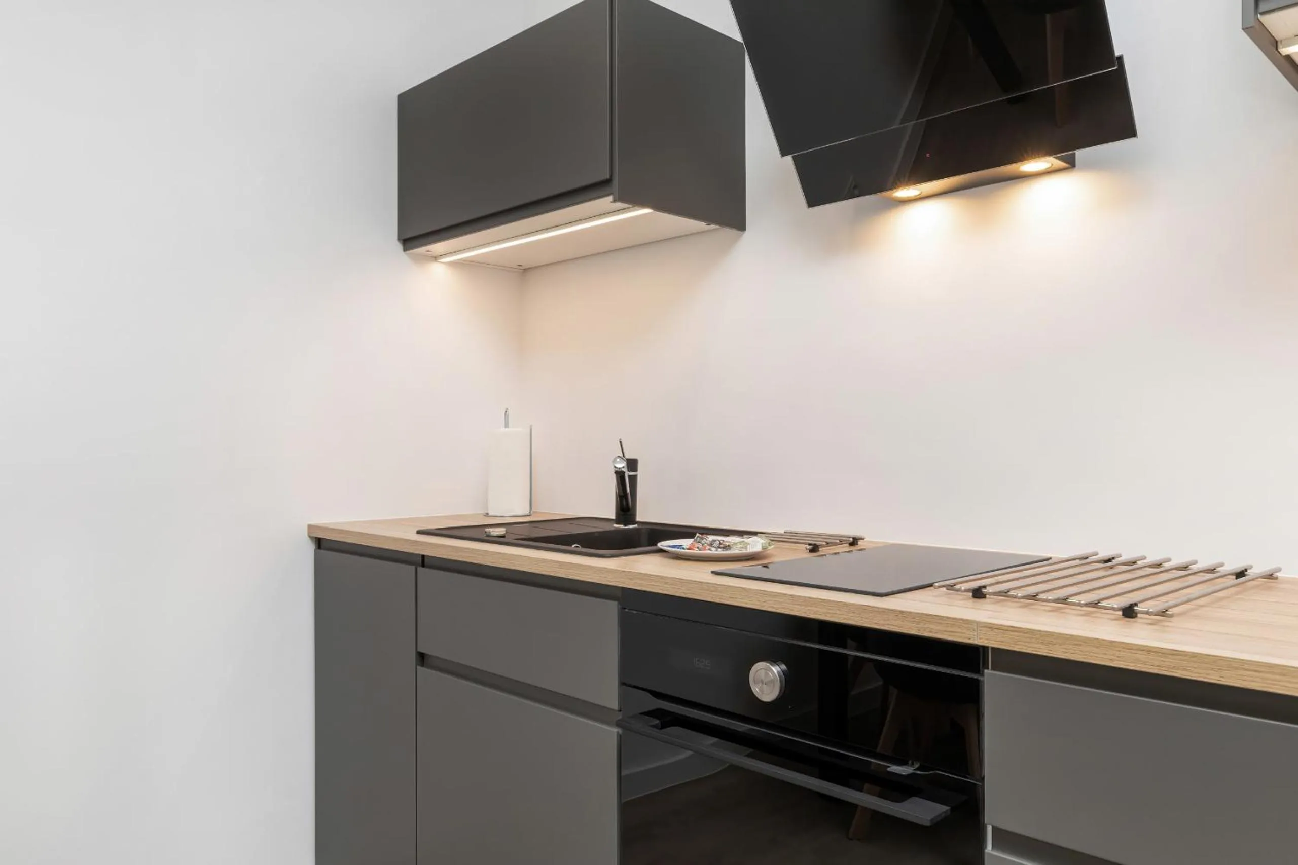 Kitchen or kitchenette in Modern City Center Apartments by Noclegi Renters