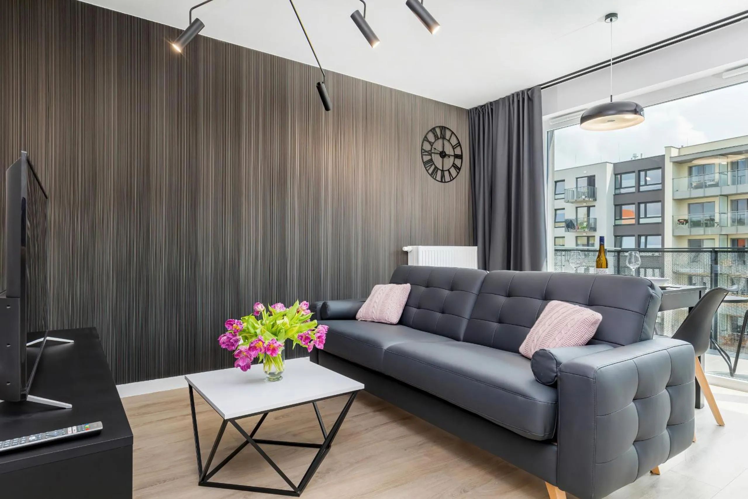 Living room in Modern City Center Apartments by Noclegi Renters