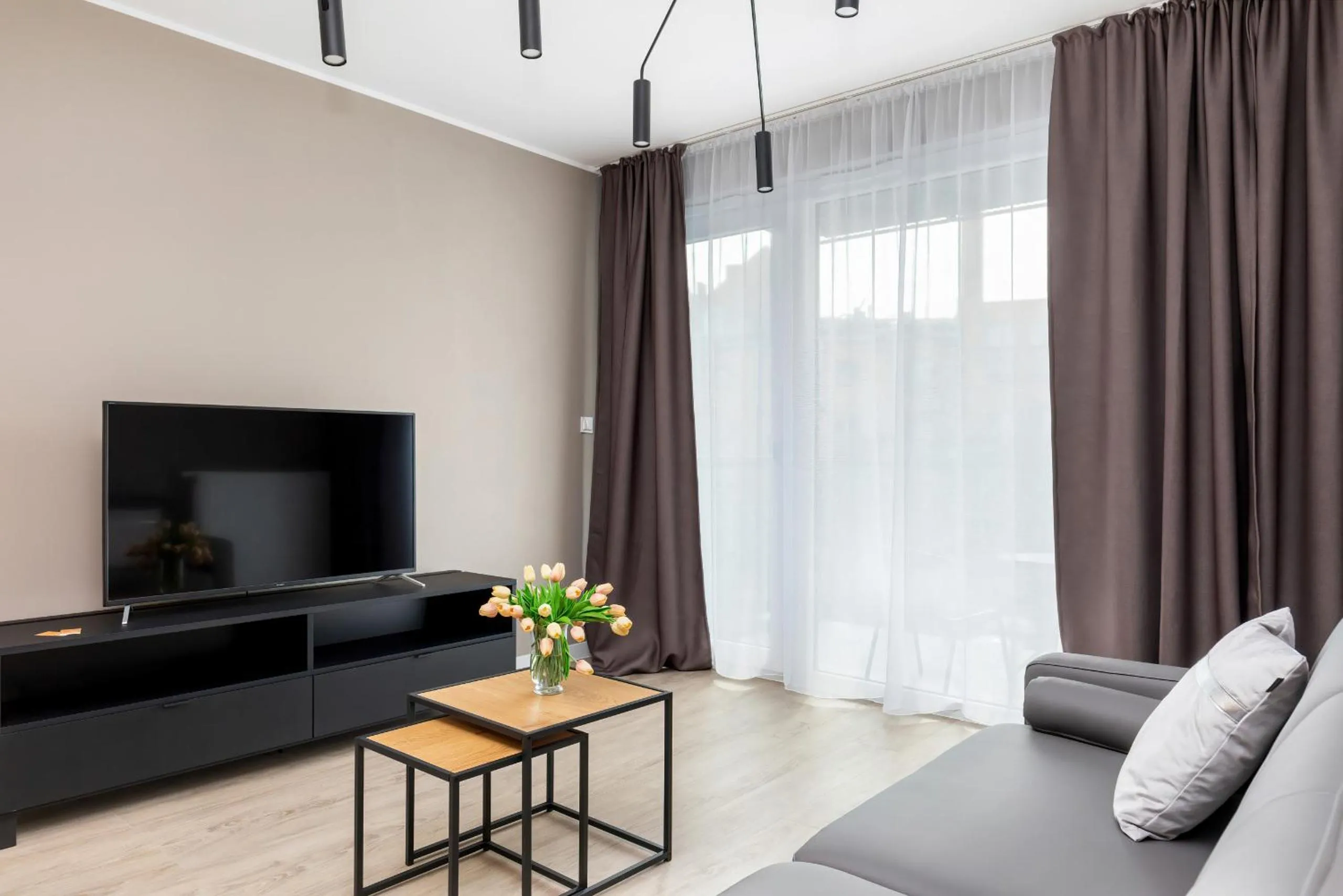 Living room in Modern City Center Apartments by Noclegi Renters