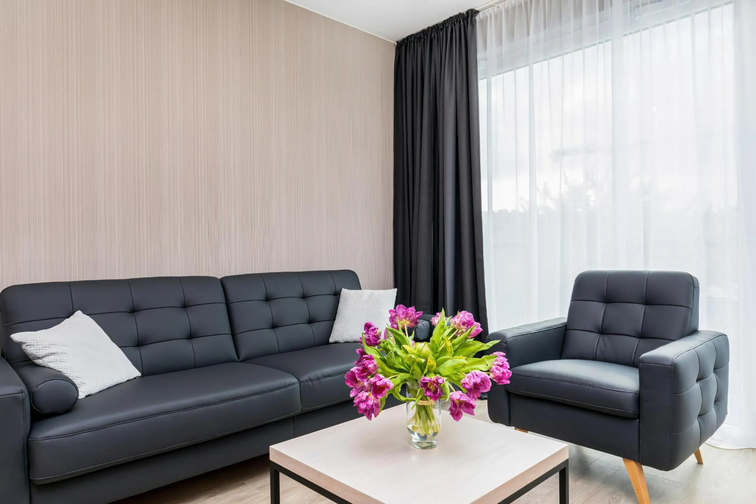 Living room in Modern City Center Apartments by Noclegi Renters