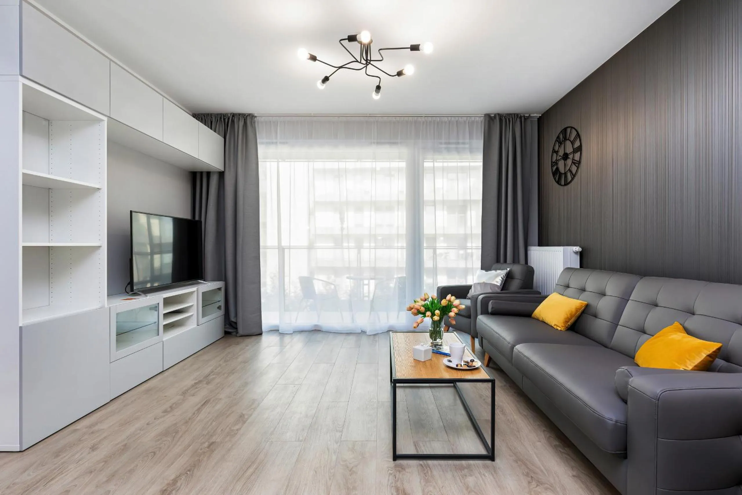 Living room in Modern City Center Apartments by Noclegi Renters