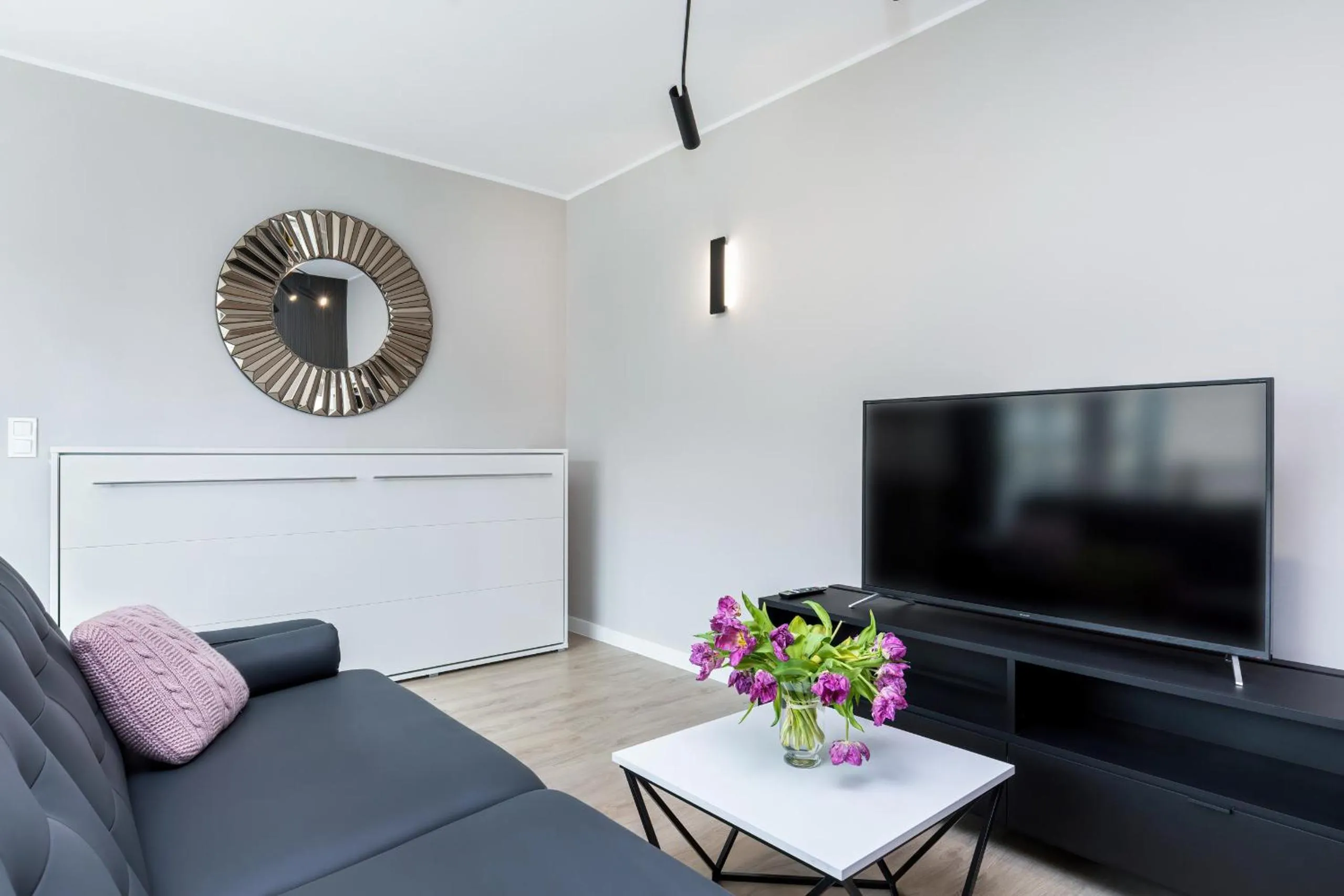 Living room in Modern City Center Apartments by Noclegi Renters